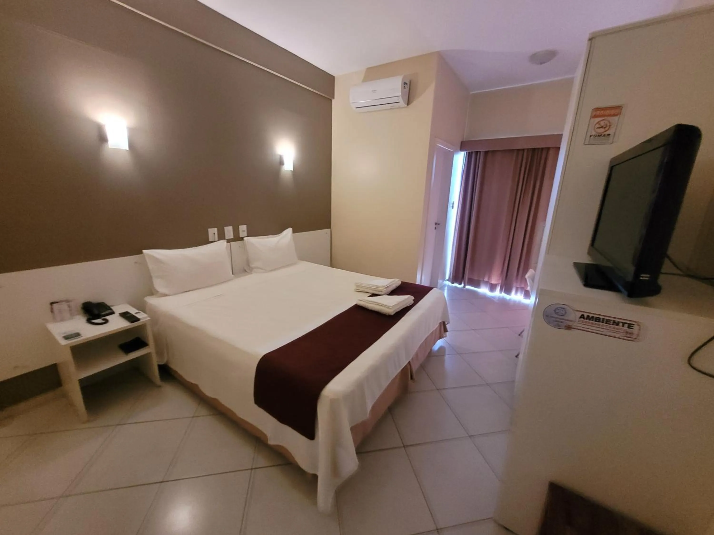 Bed in Sandrin Praia Hotel