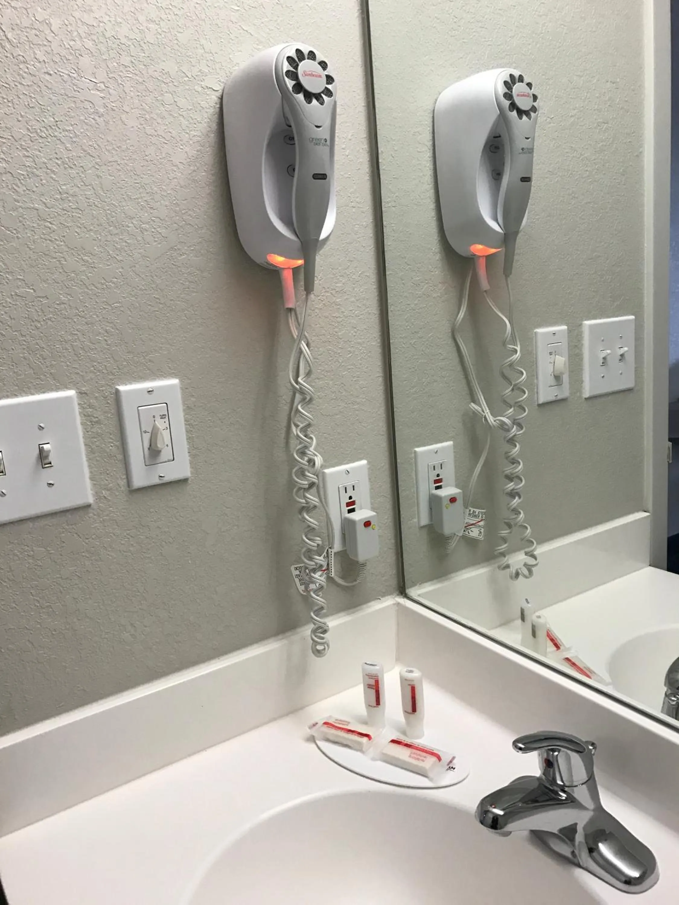 Bathroom in Microtel Inn By Wyndham Louisville East