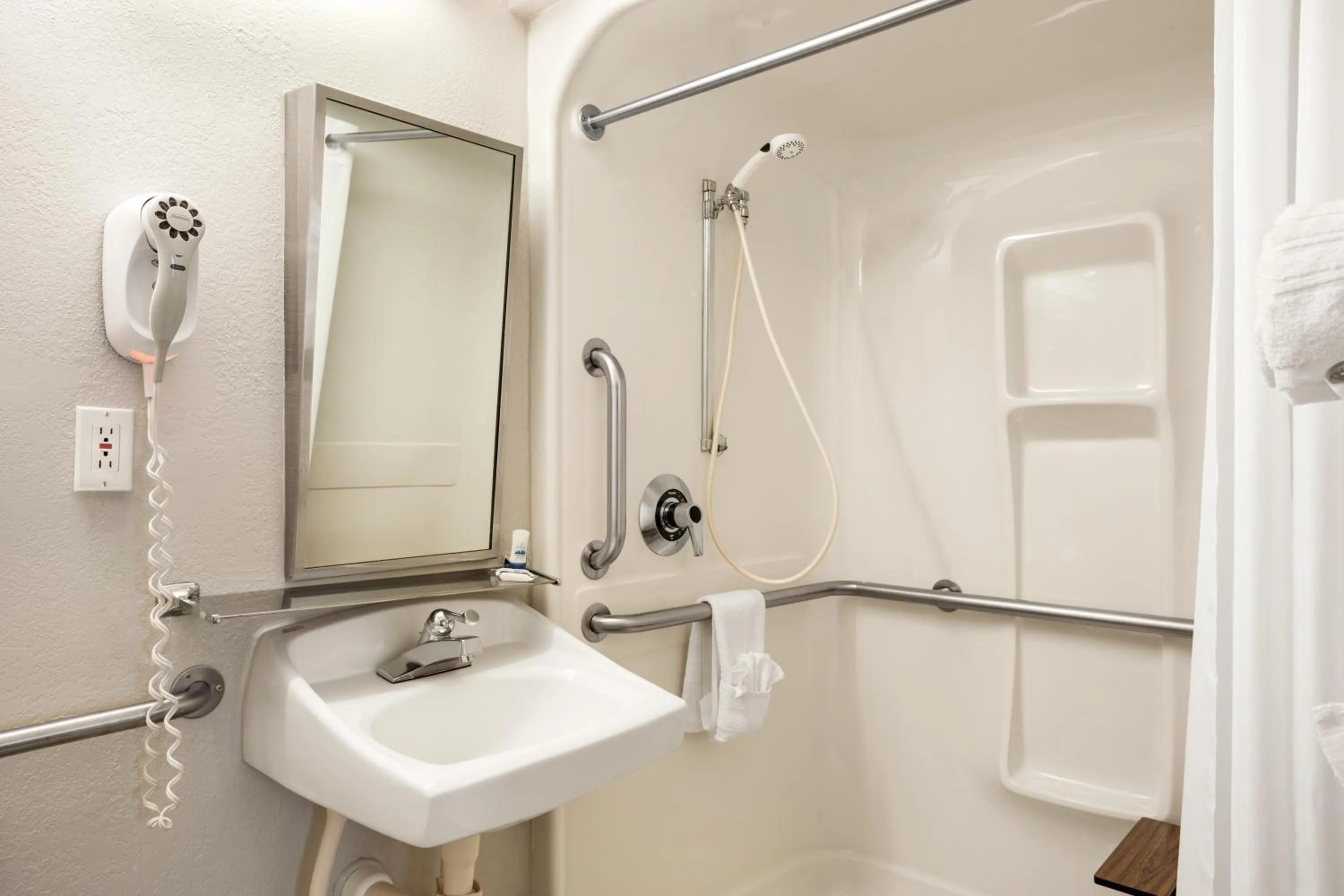 Toilet in Microtel Inn By Wyndham Louisville East