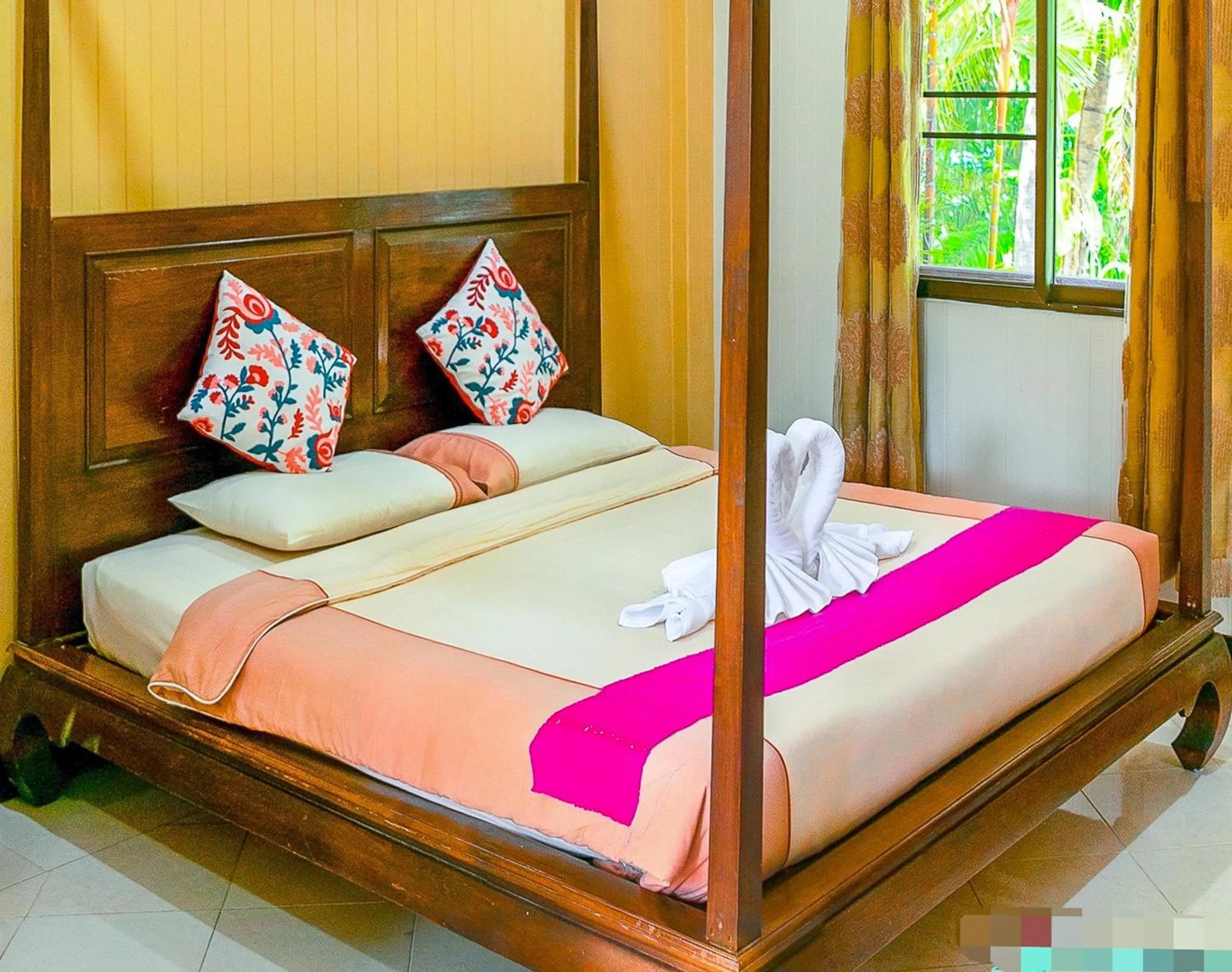 Bed in Kasalong Resort and Spa Pattaya