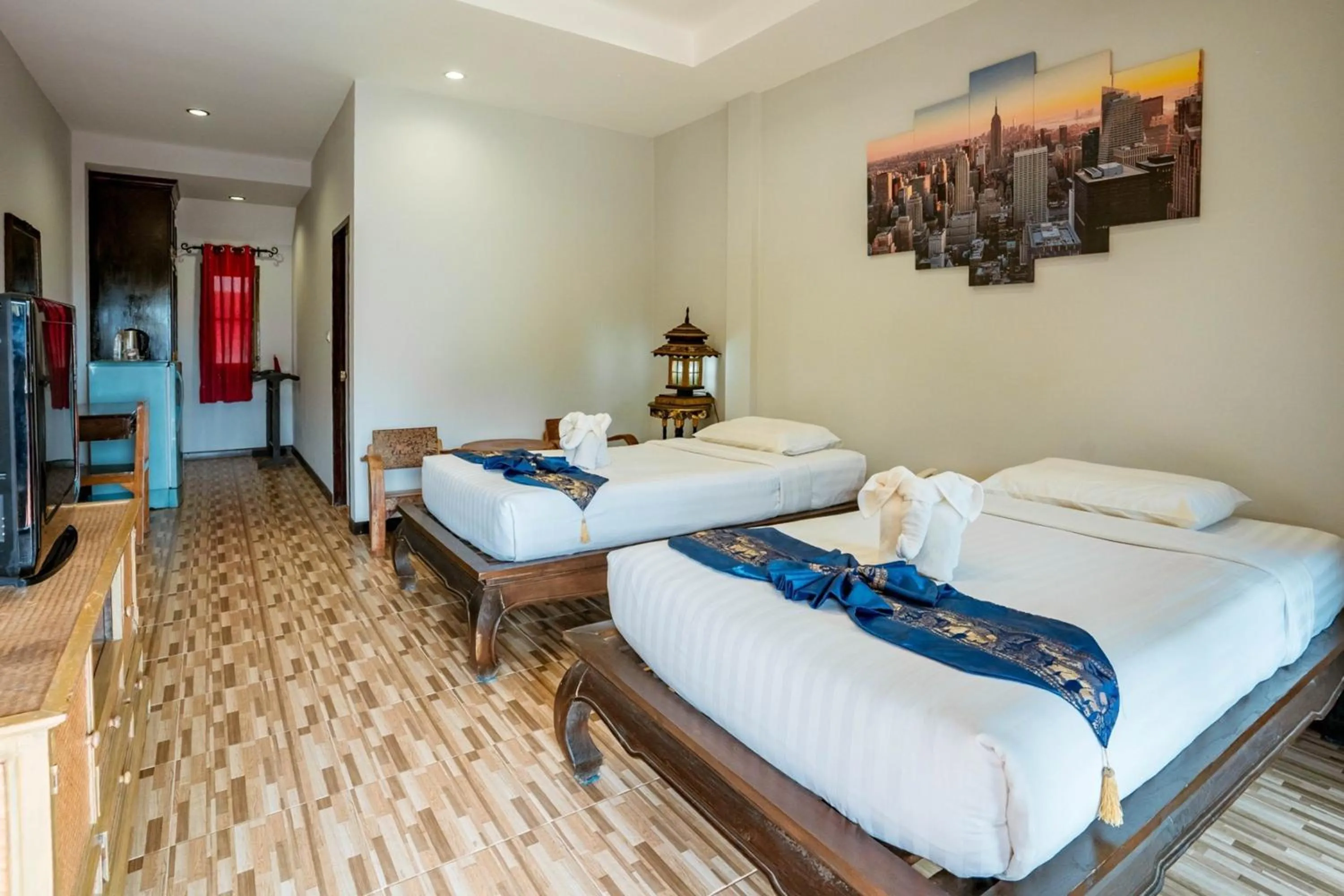 Bed in Kasalong Resort and Spa Pattaya