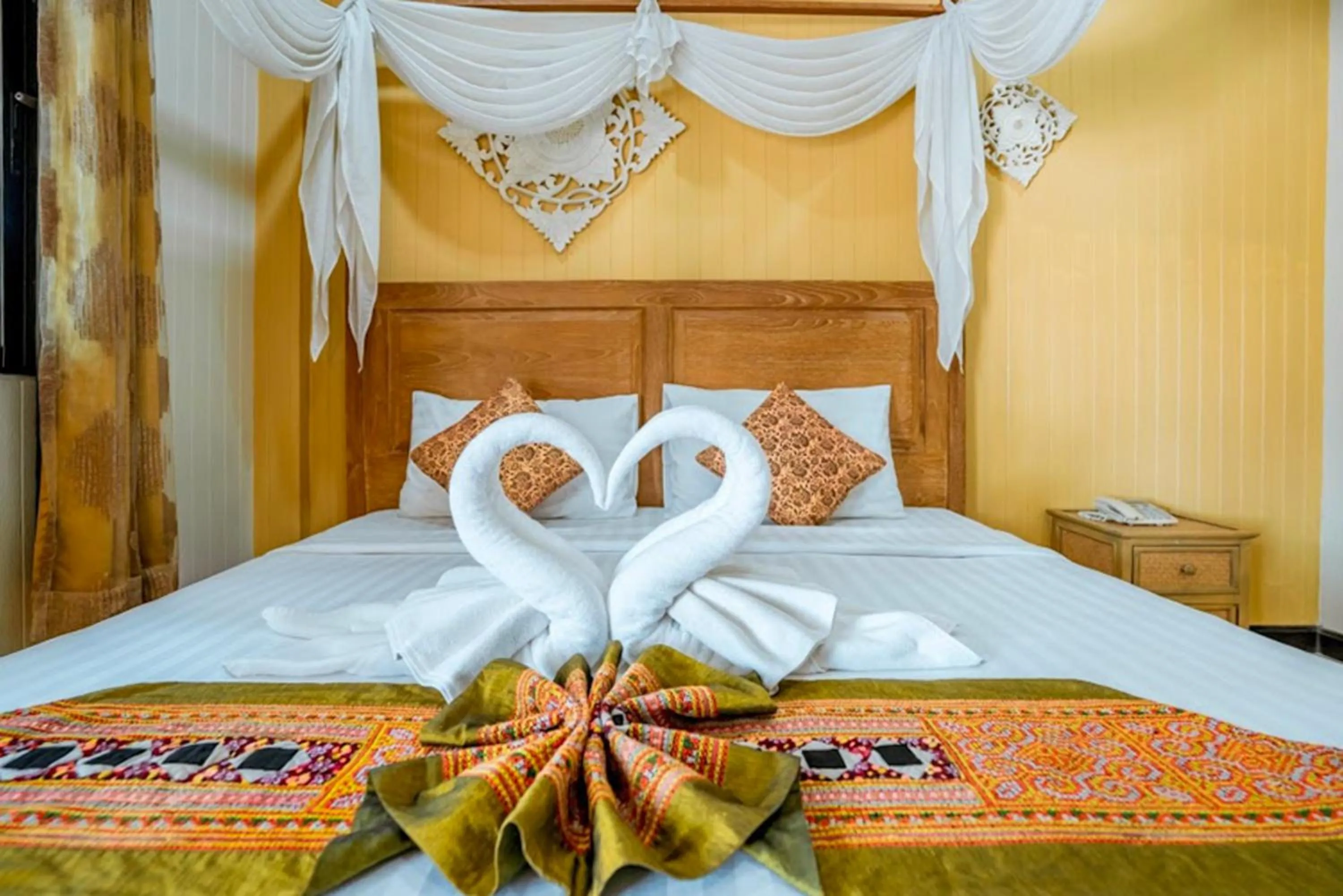 Bed in Kasalong Resort and Spa Pattaya