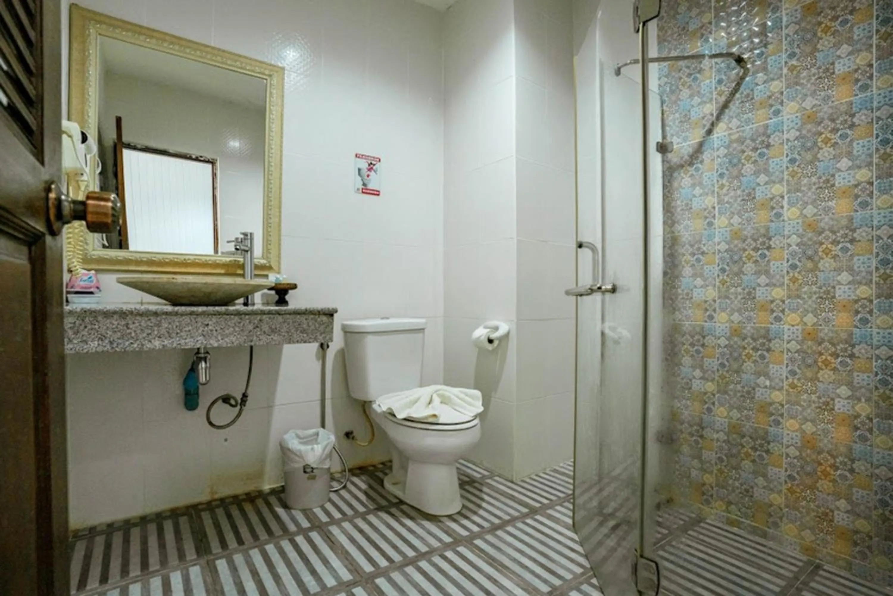 Shower in Kasalong Resort and Spa Pattaya