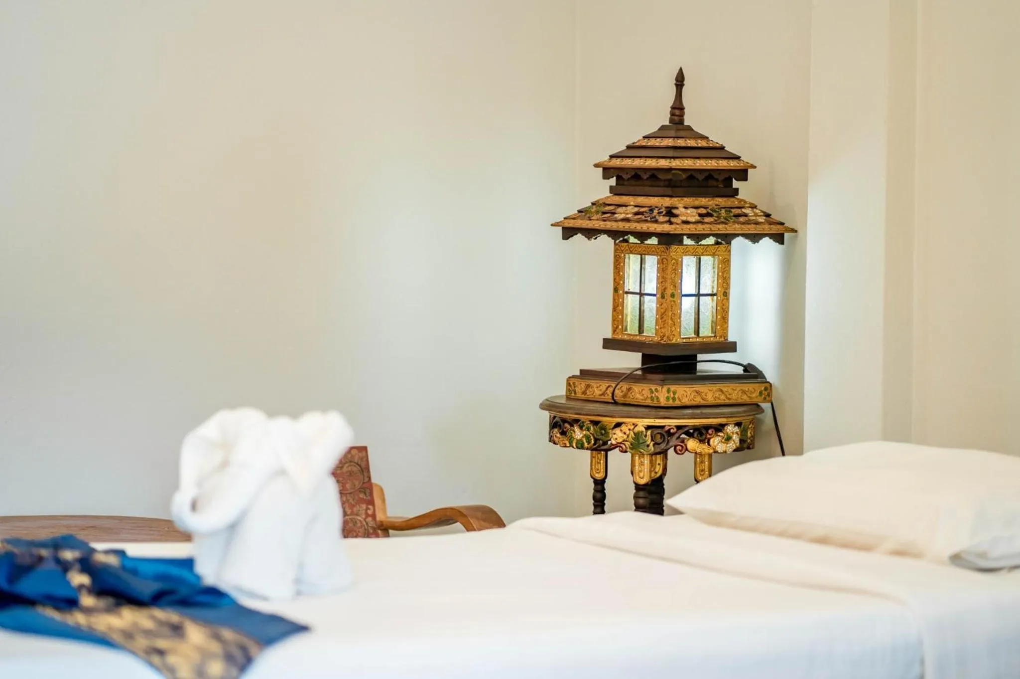 Bed in Kasalong Resort and Spa Pattaya