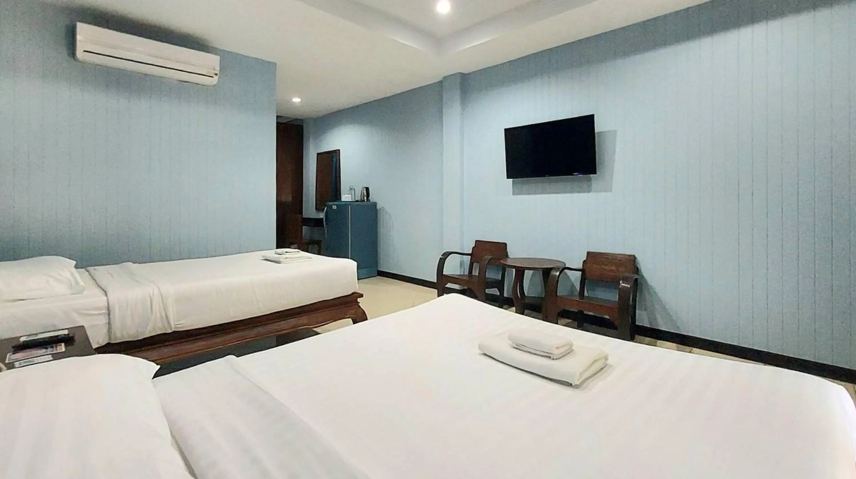 Bed in Kasalong Resort and Spa Pattaya