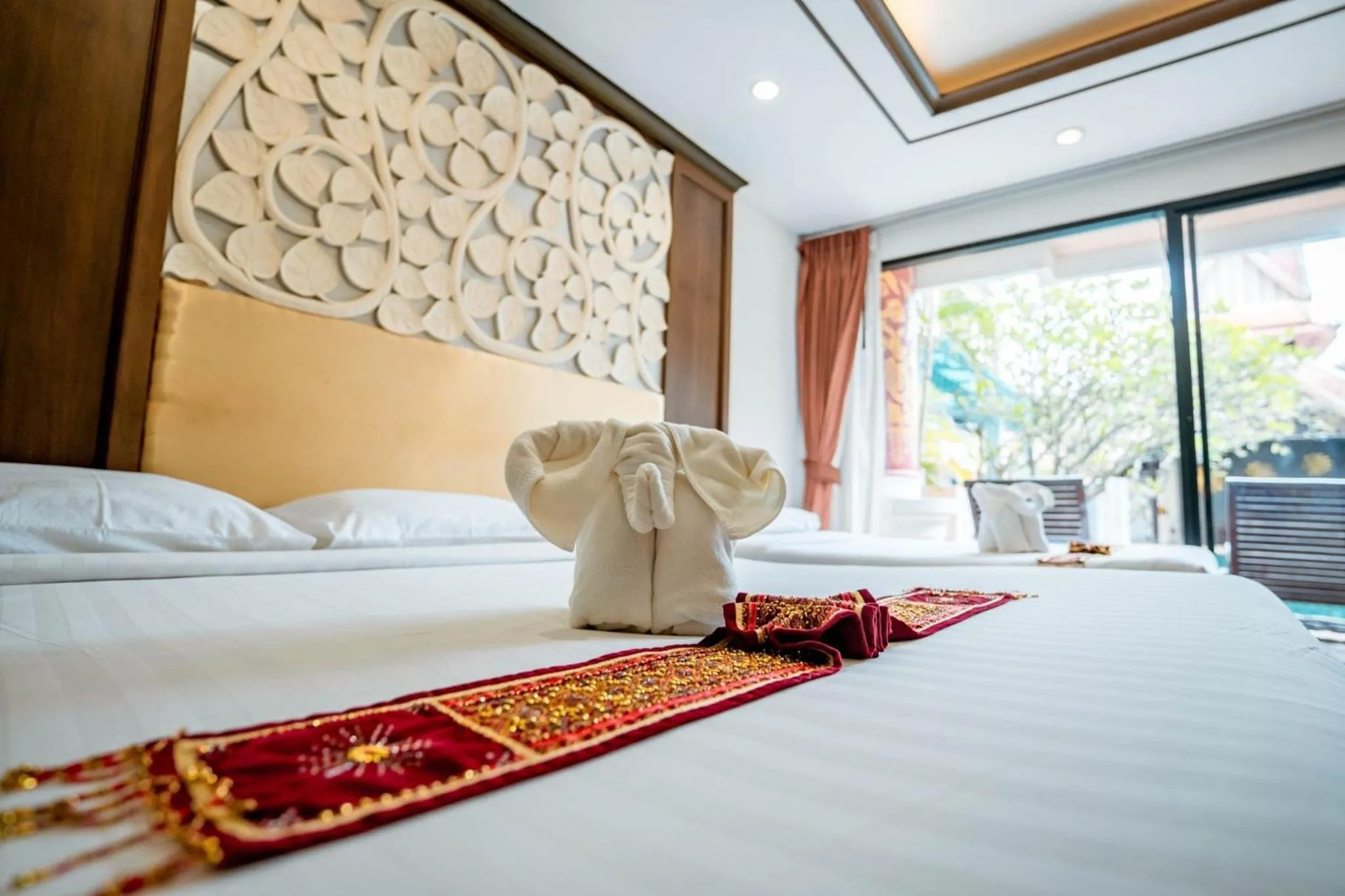 Bed in Kasalong Resort and Spa Pattaya