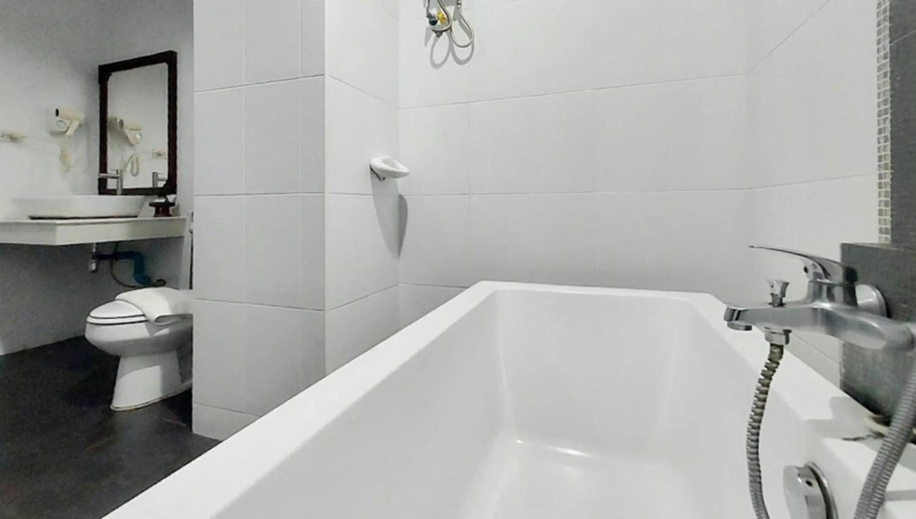 Toilet in Kasalong Resort and Spa Pattaya