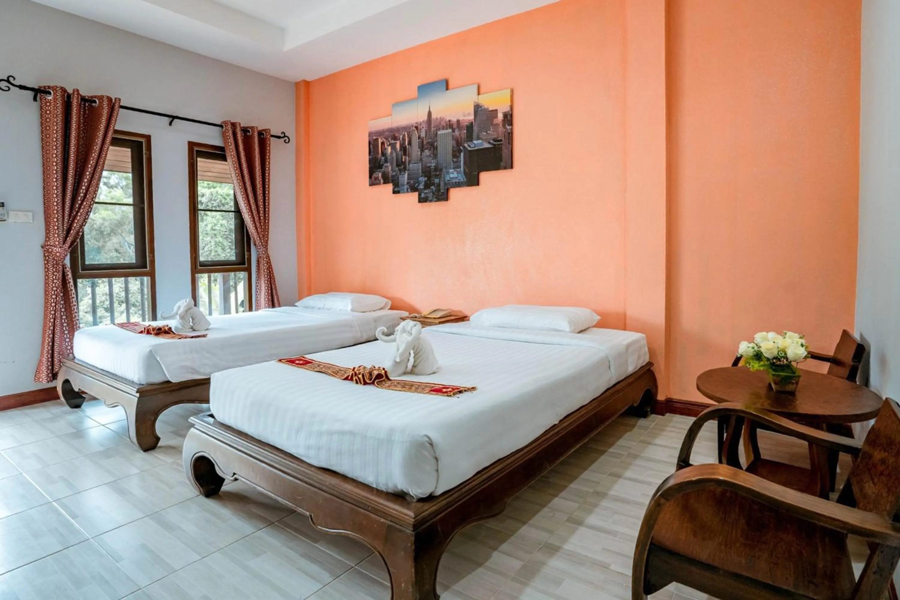 Bed in Kasalong Resort and Spa Pattaya