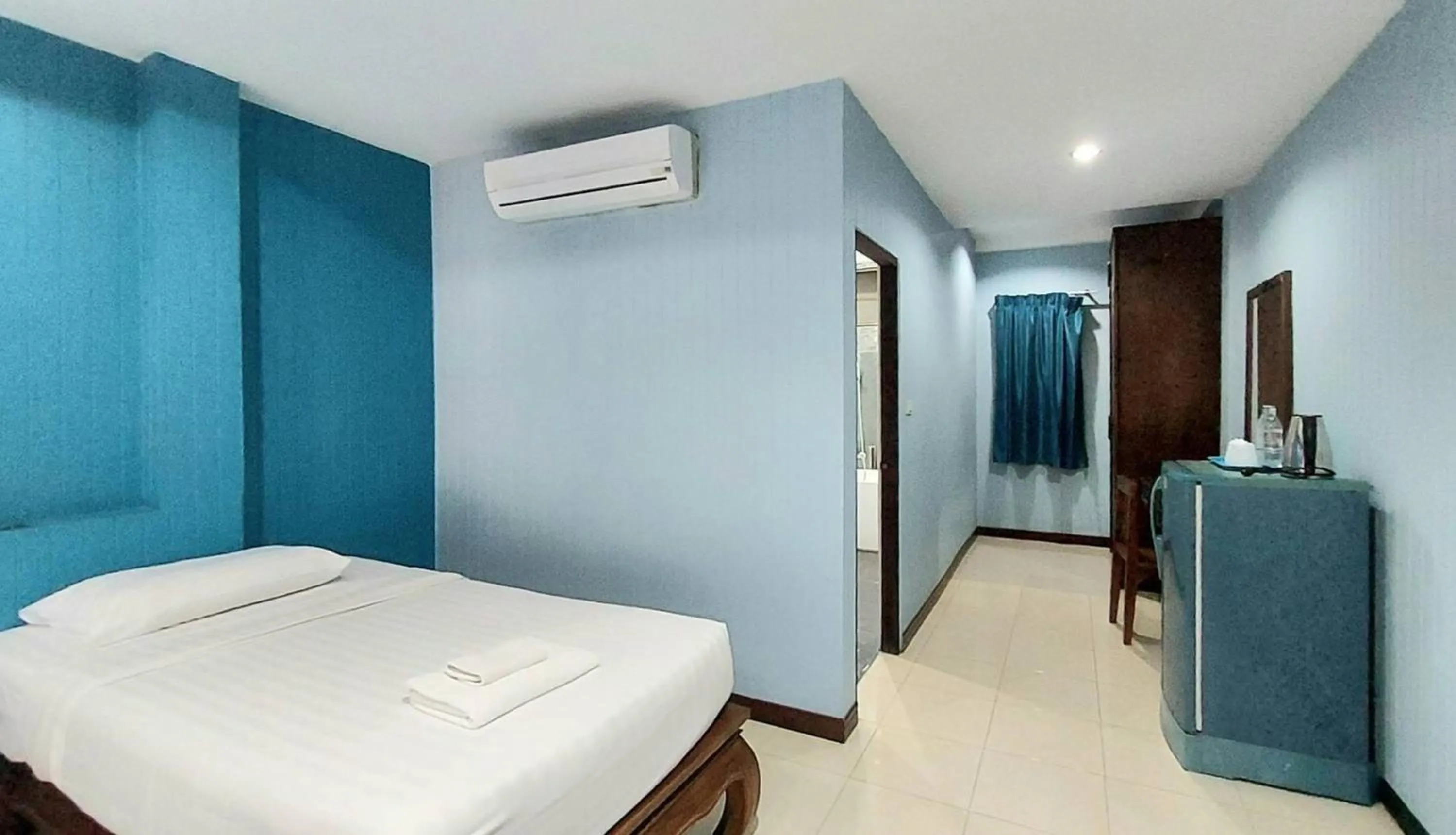 Bed in Kasalong Resort and Spa Pattaya