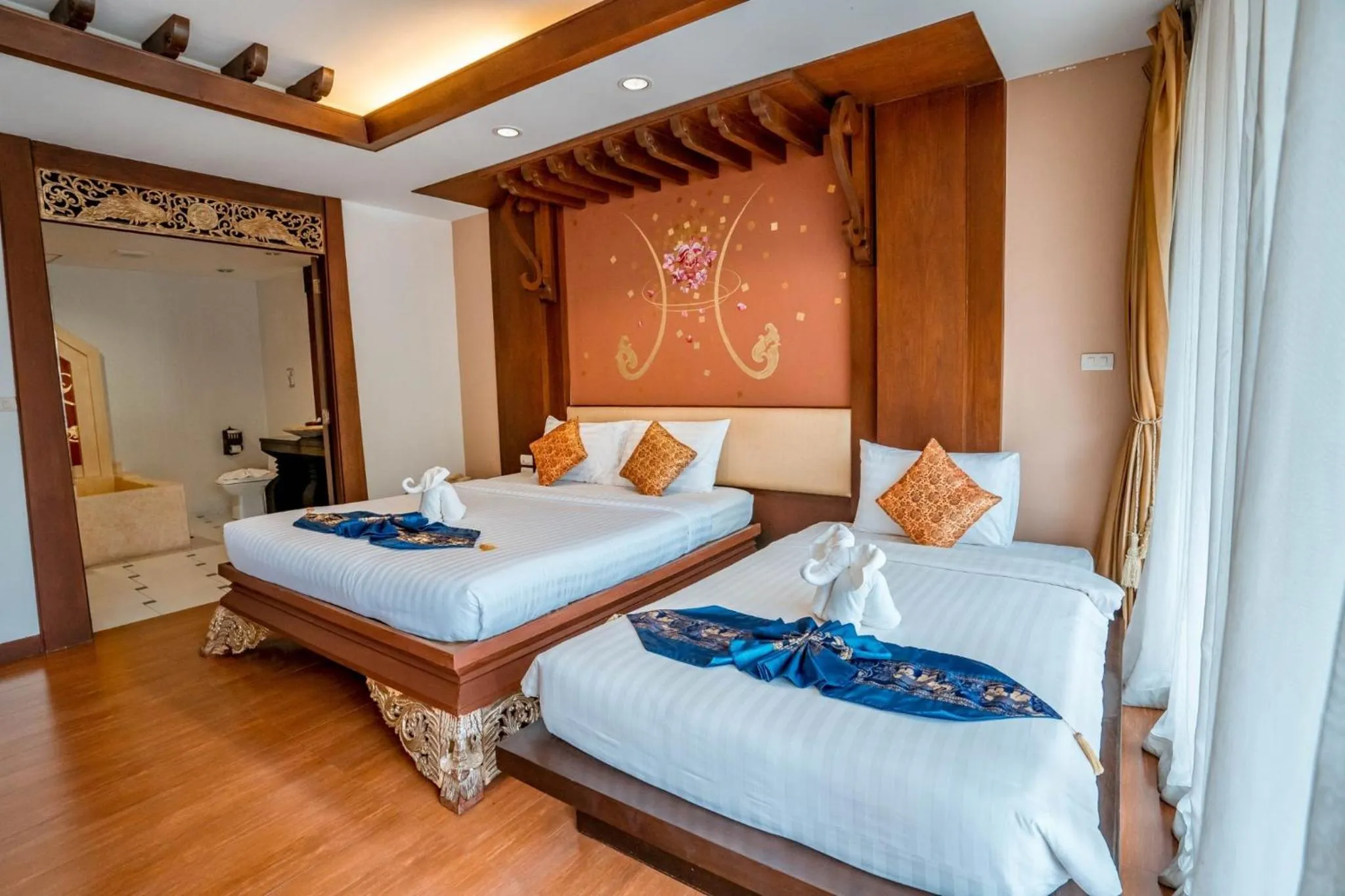 Bed in Kasalong Resort and Spa Pattaya