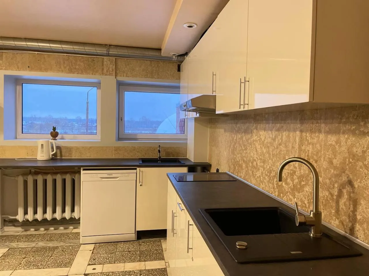 Kitchen or kitchenette in Riverside Motel Jelgava