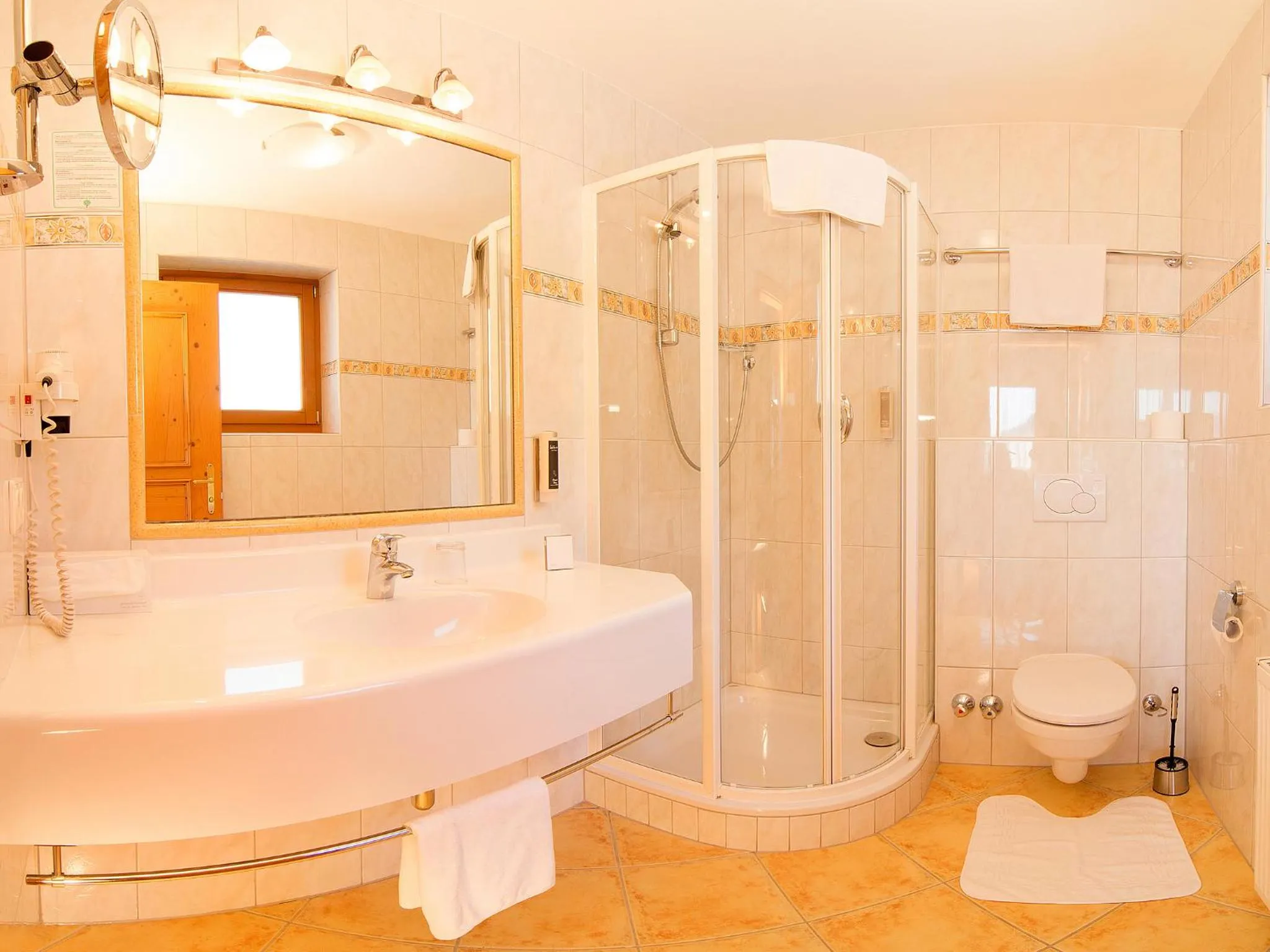 Bathroom in Alpenhotel Tirolerhof