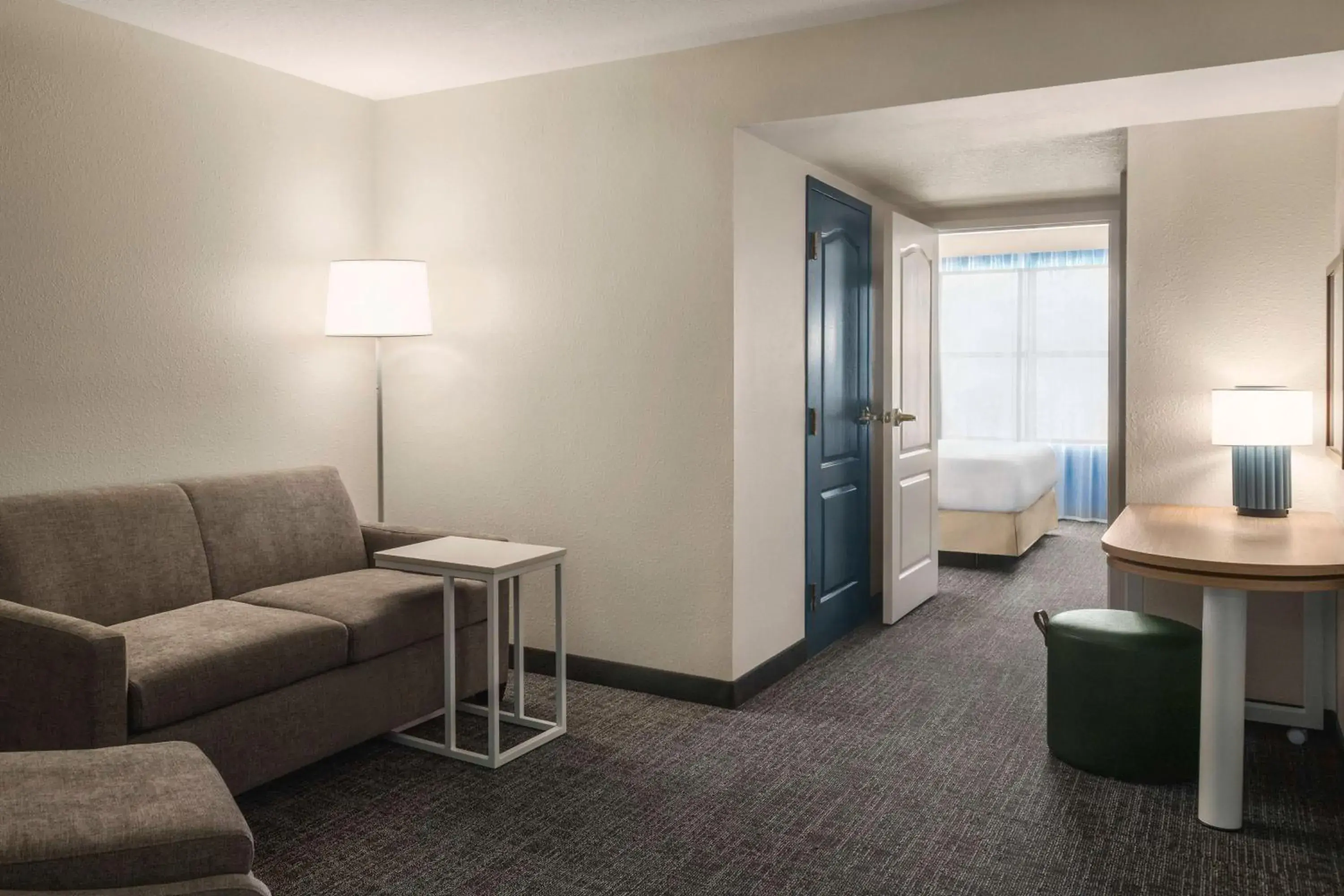 Living room in Spark by Hilton Orlando Universal Blvd Living room in Spark by Hilton Orlando Universal Blvd