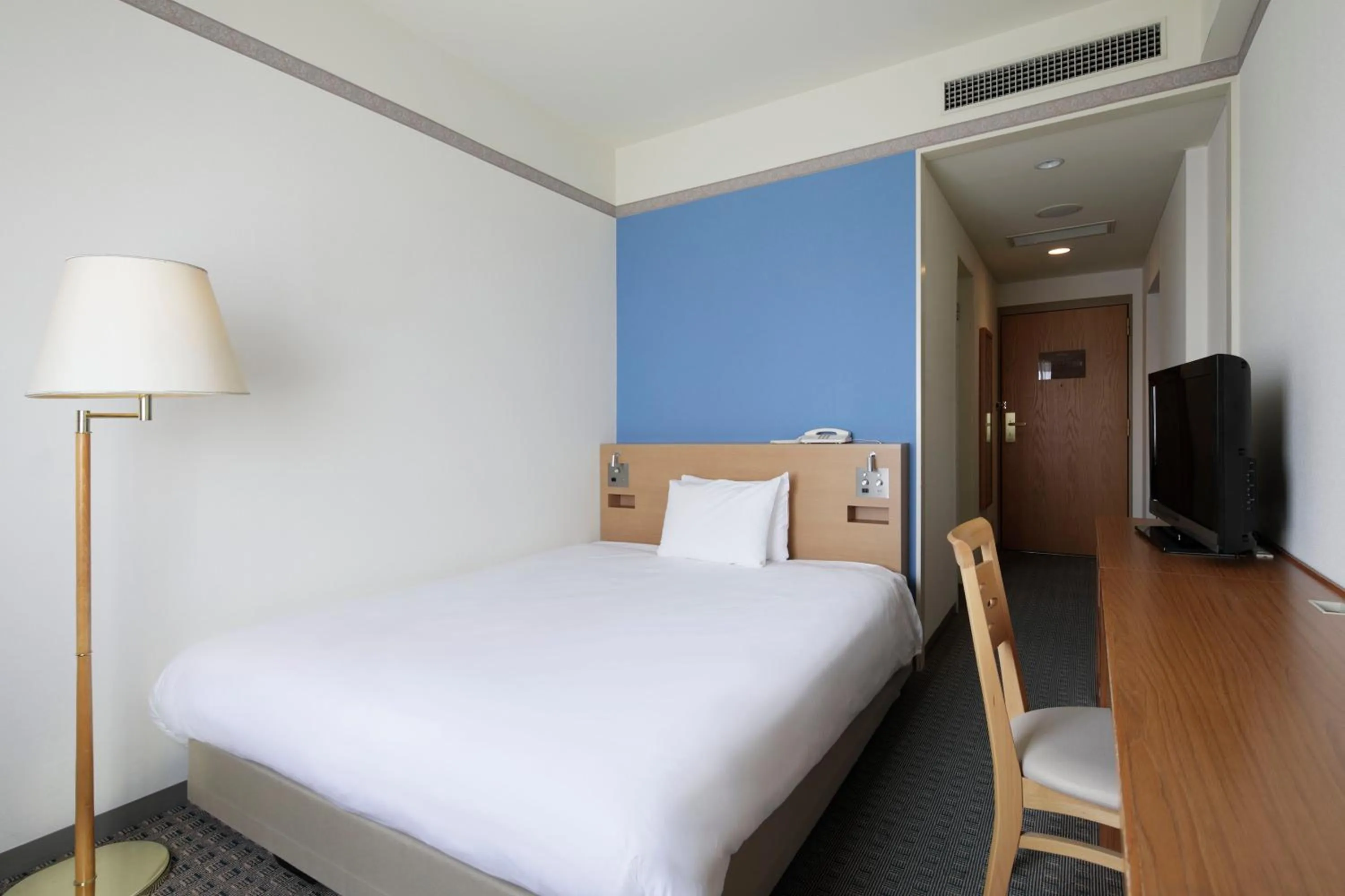 Bed in The Mark Grand Hotel