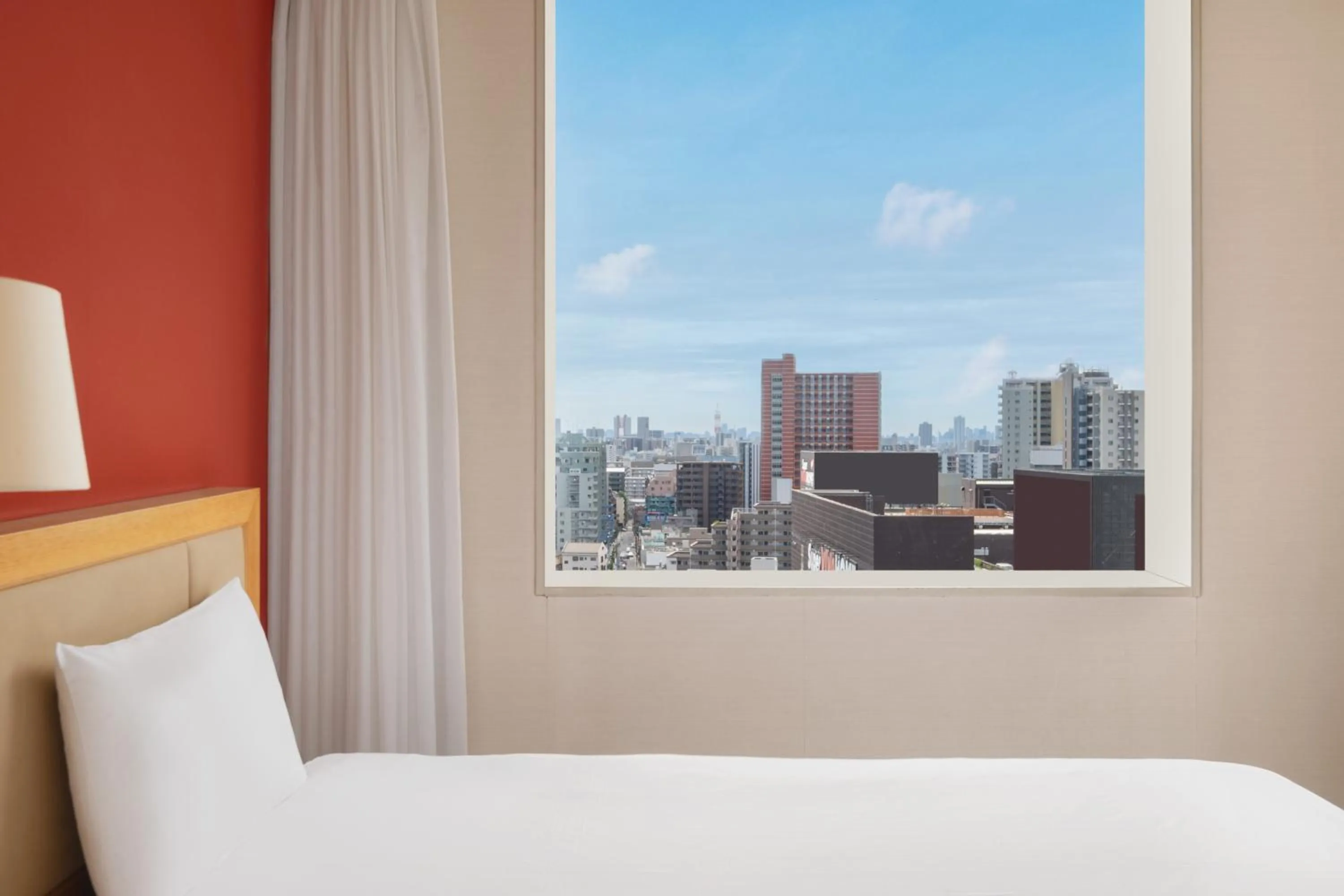 Bed in The Mark Grand Hotel