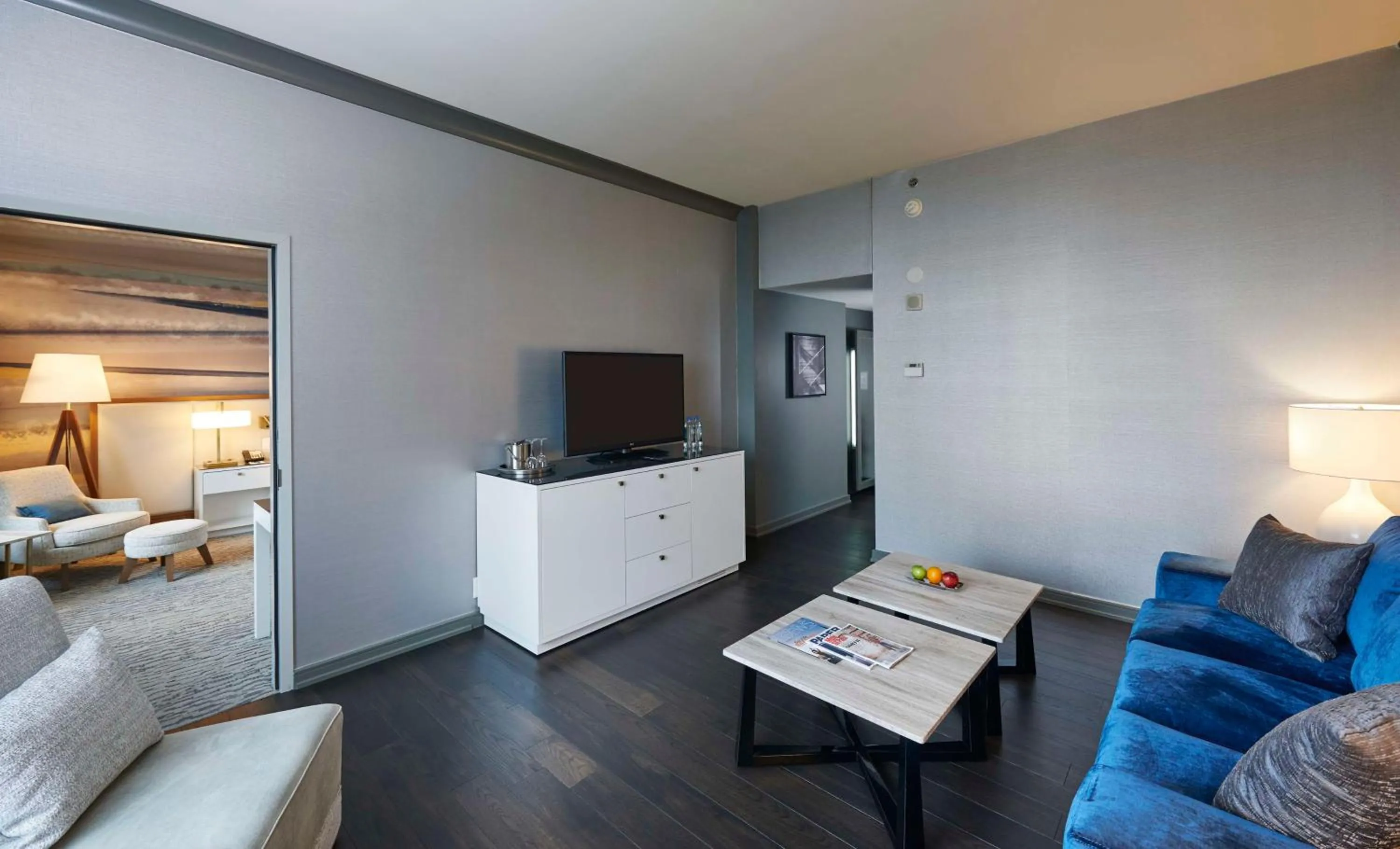 Living room, Bed in The Lofton Hotel Minneapolis, Tapestry Collection by Hilton