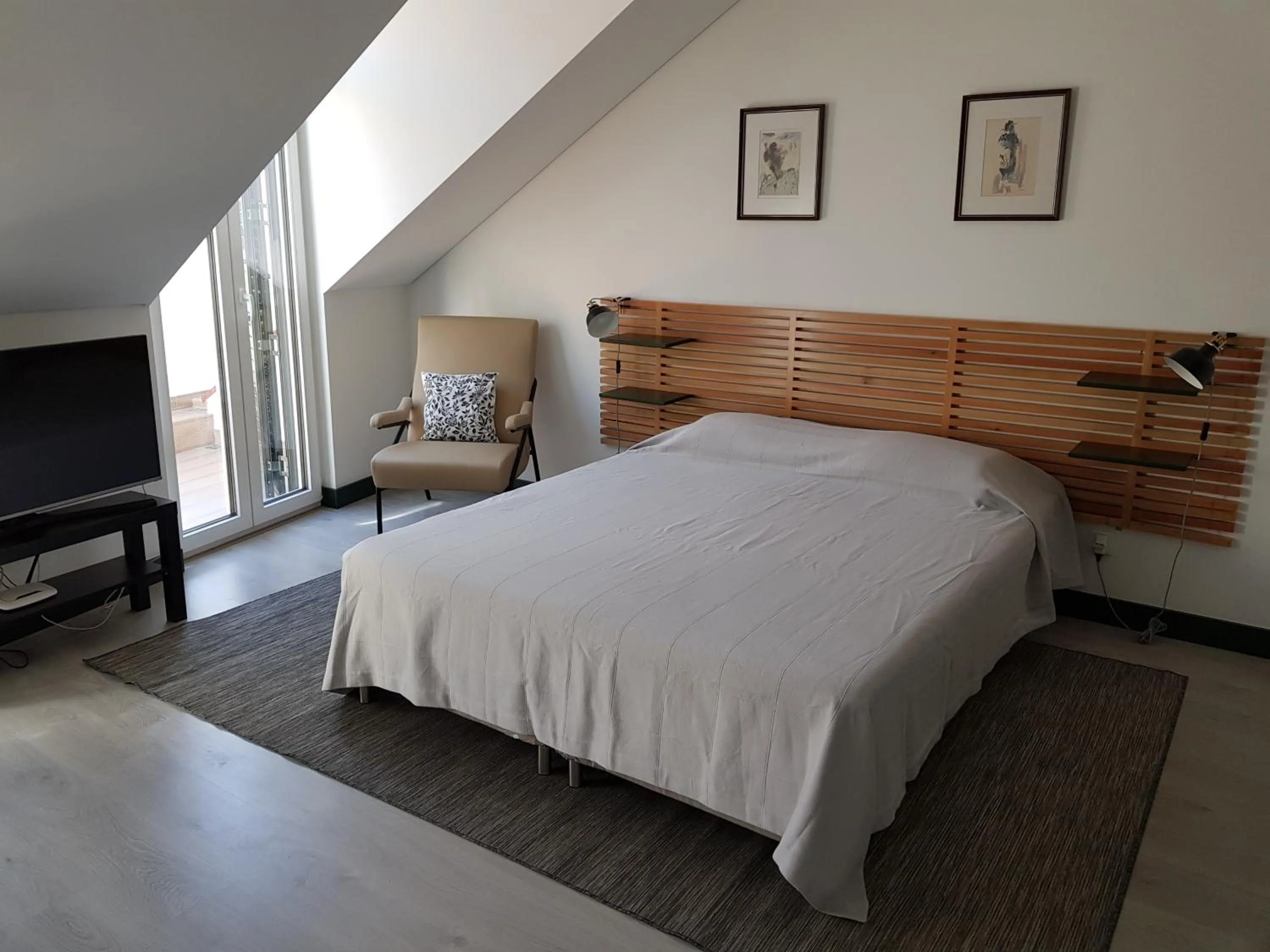 Bed in DoBairro suites at Bairro Alto
