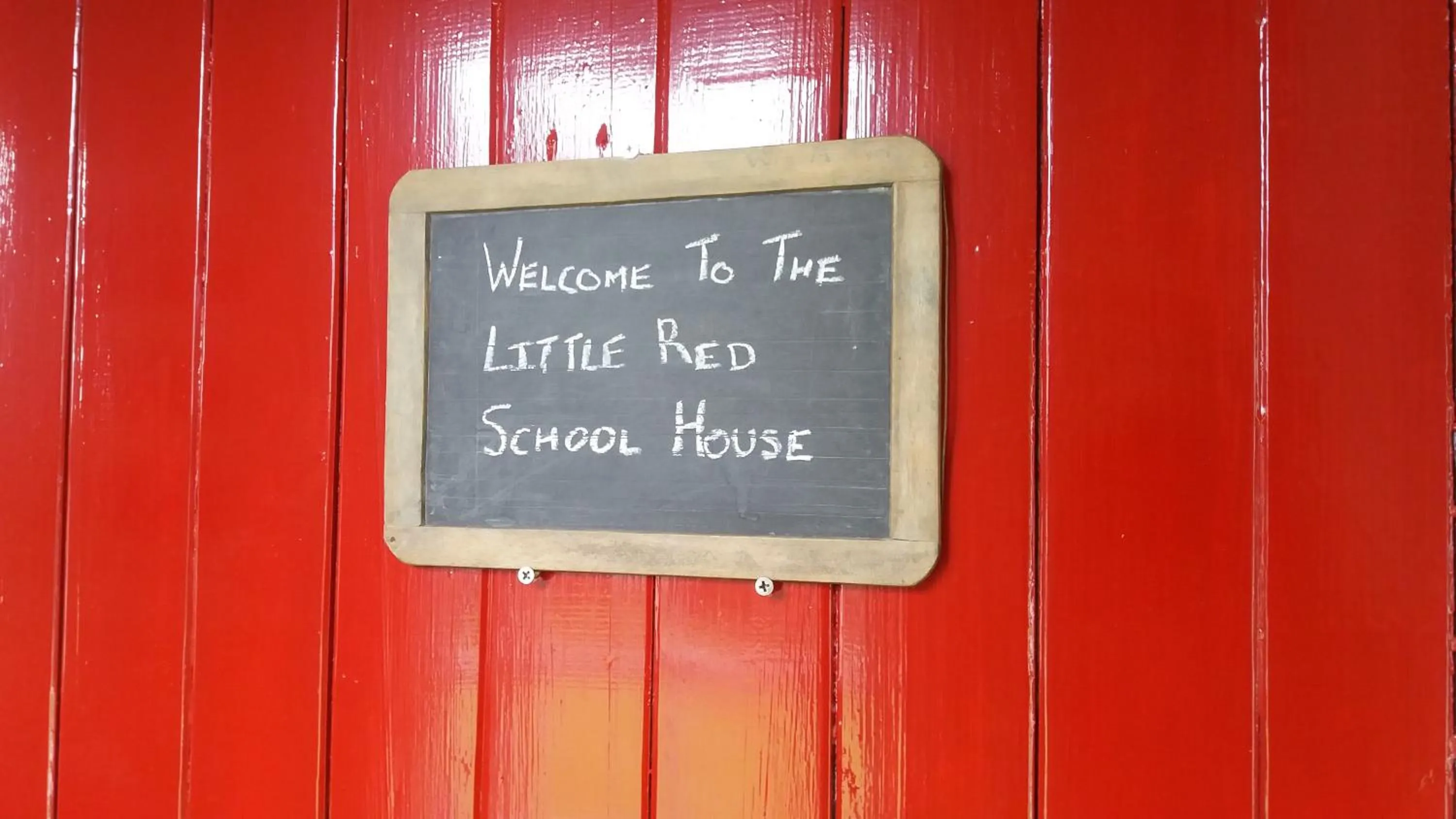 Property logo or sign in Little Red School House
