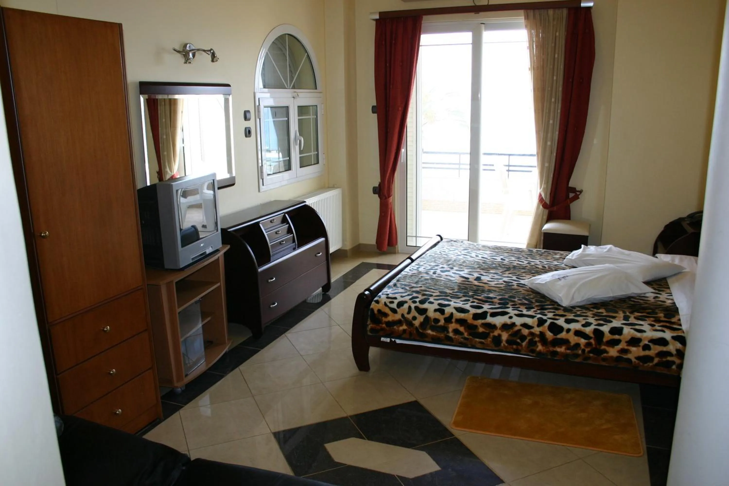 Bed in Petit Palais Hotel