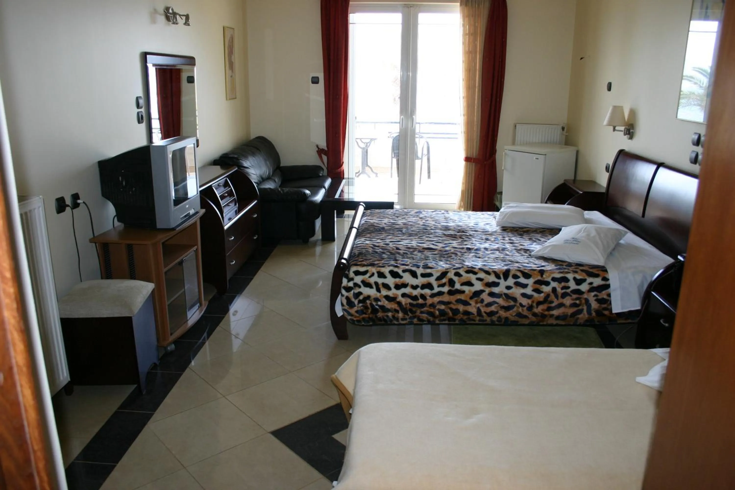 Bed in Petit Palais Hotel