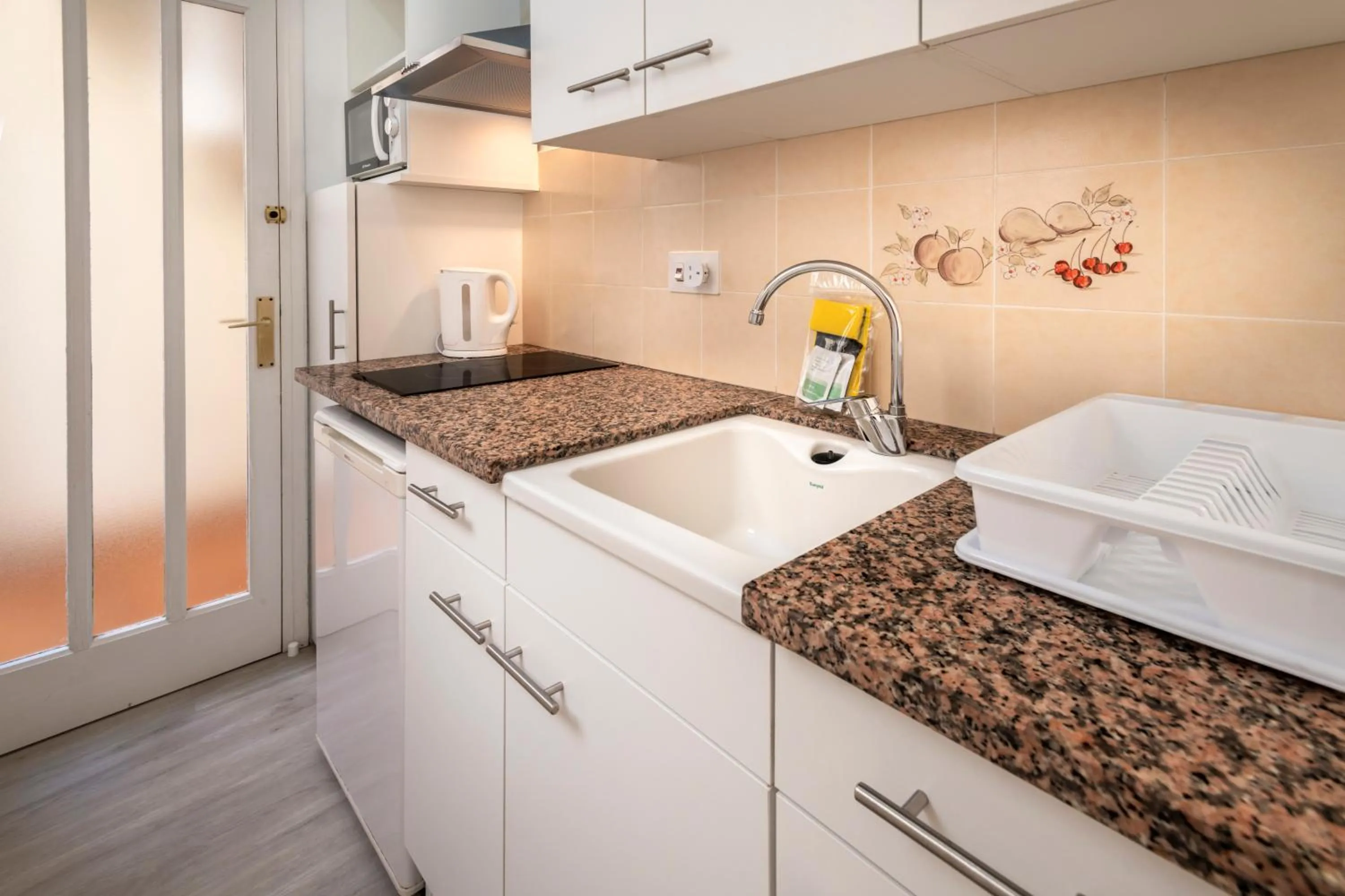 Kitchen or kitchenette in Apartments Sorrabona