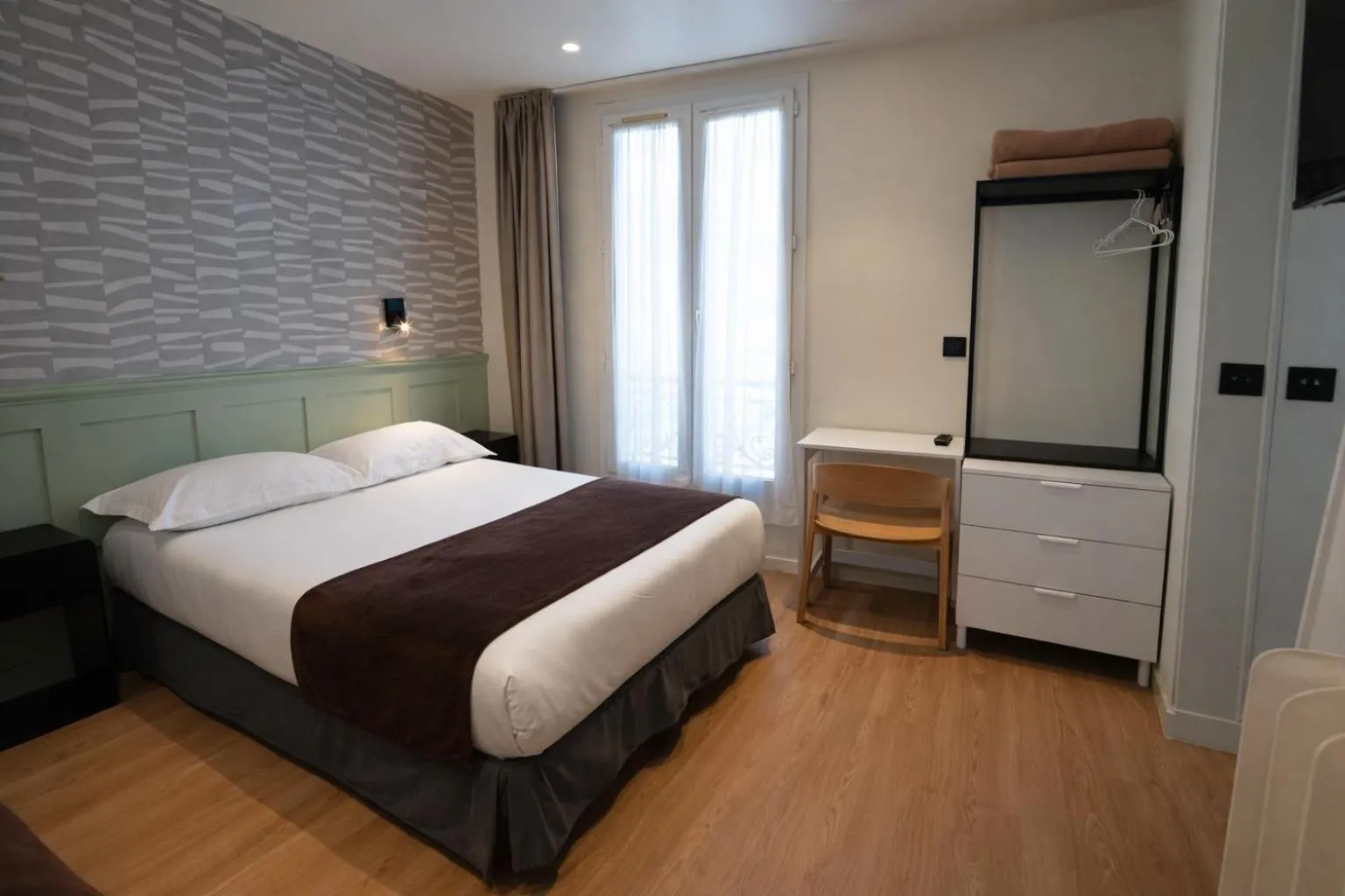 Bed in Hotel Cosmos