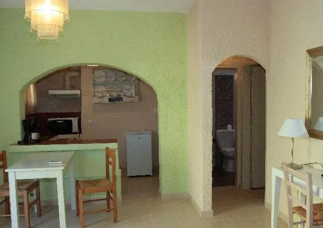 Kitchen or kitchenette in Perla Apartments