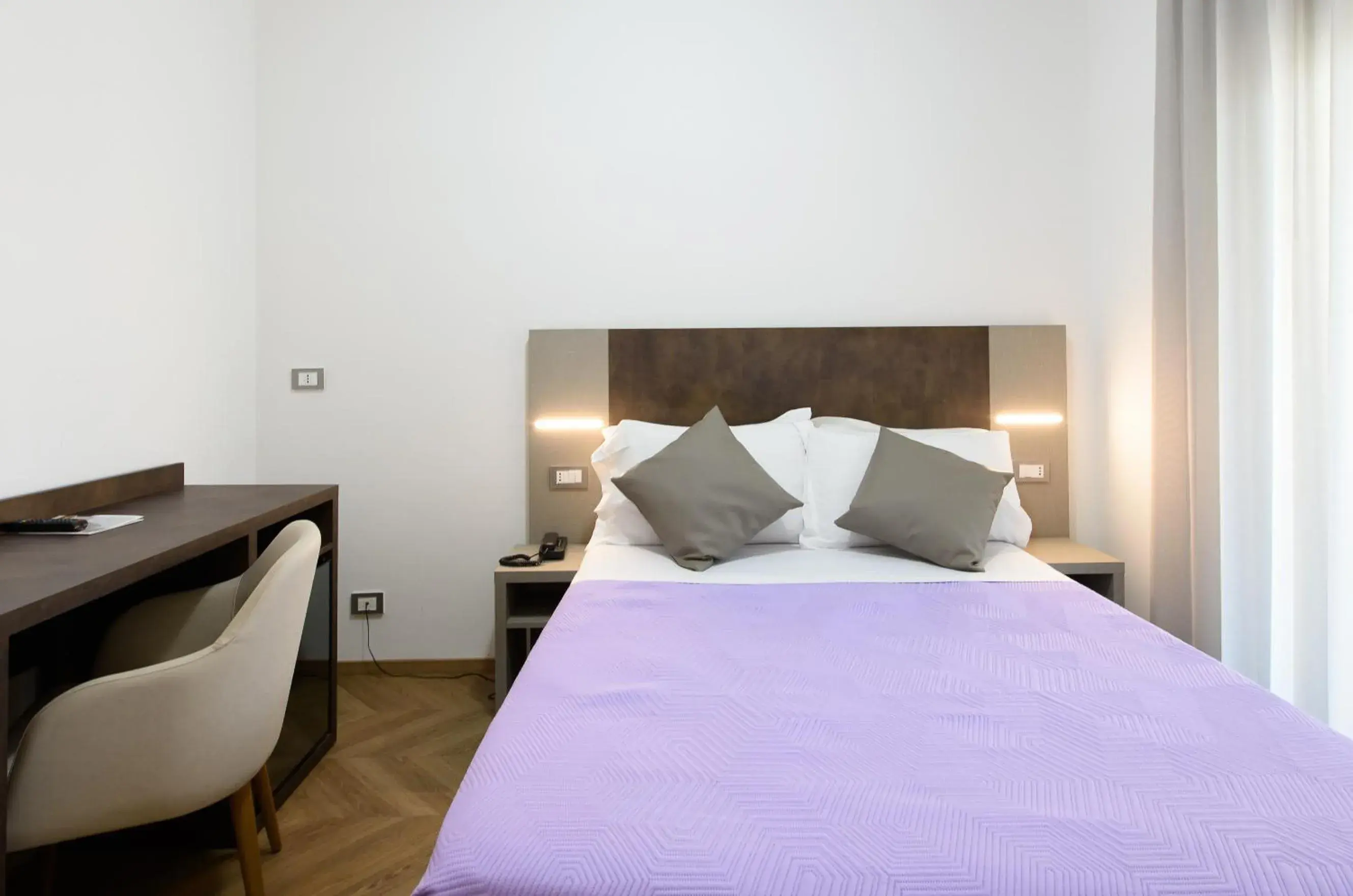 Bed in Hotel Casa Tra Noi Bed in Hotel Casa Tra Noi