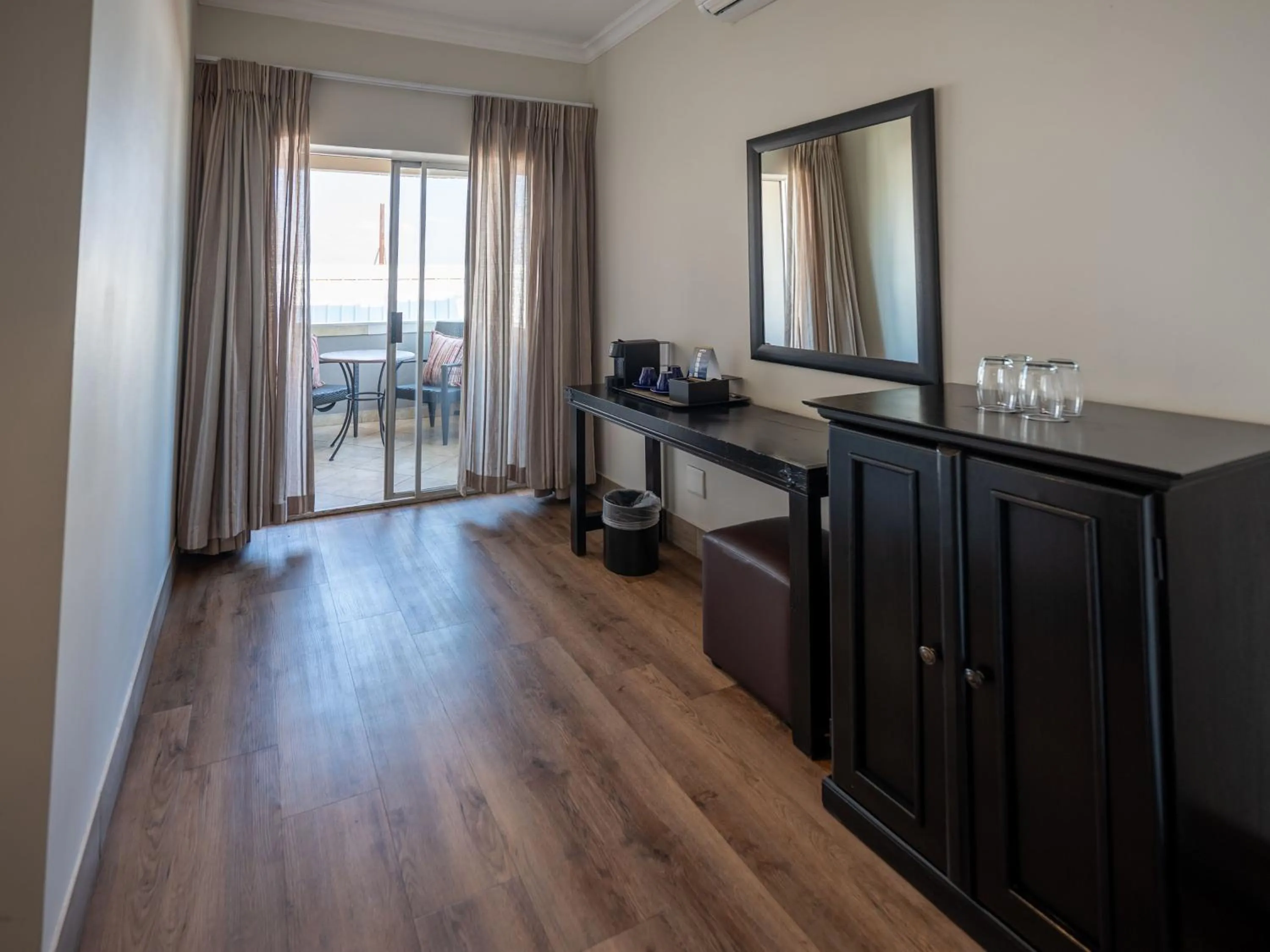 Living room in ANEW Hotel Highveld Emalahleni