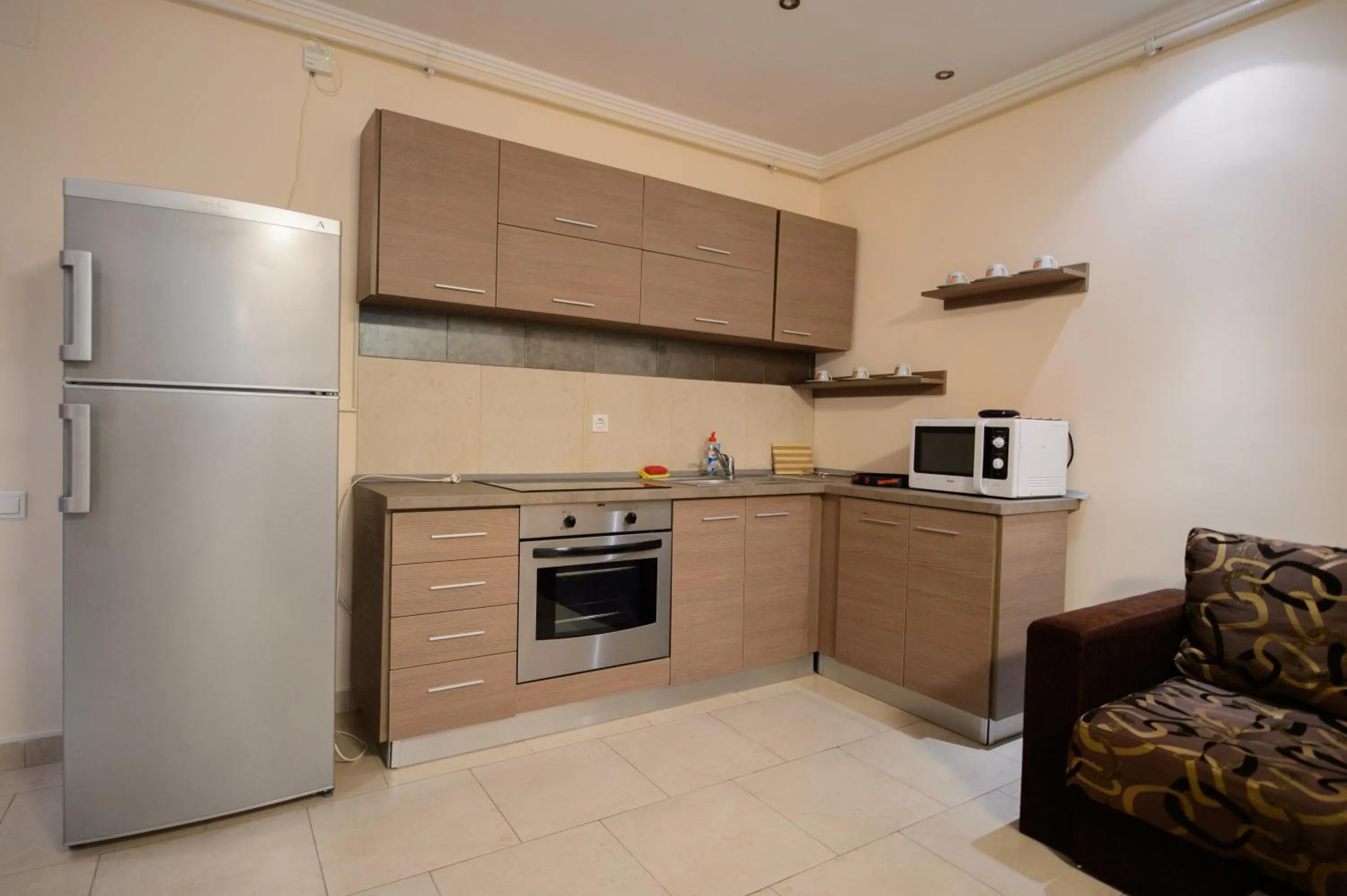 Kitchen or kitchenette in Holiday Olimp Hotel
