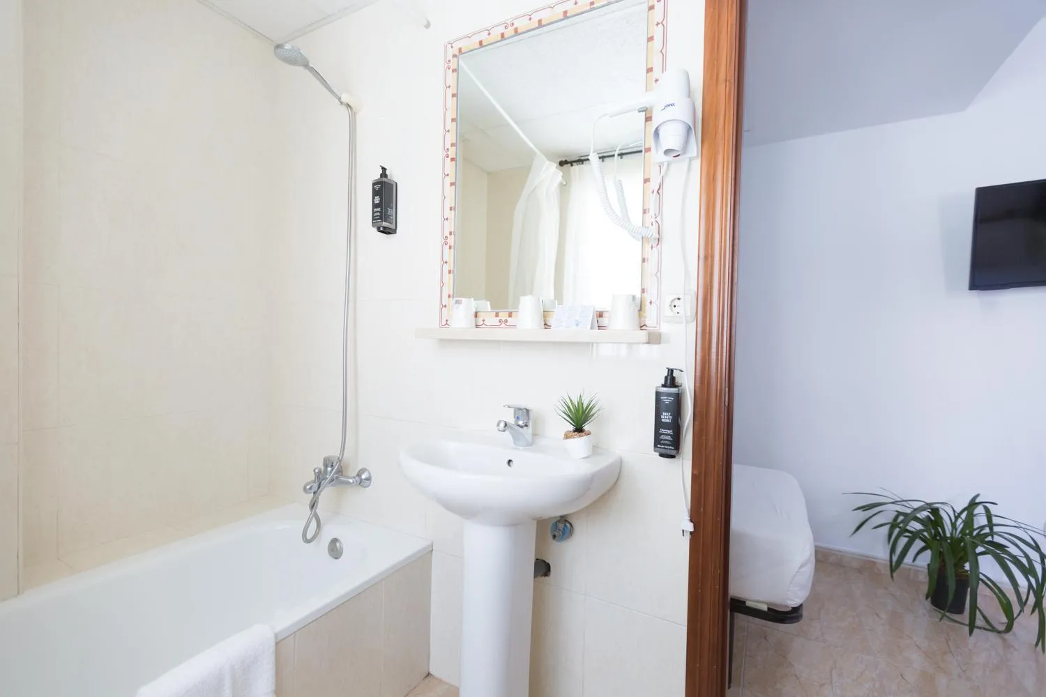 Bathroom in Hotel Mediterráneo by Croma