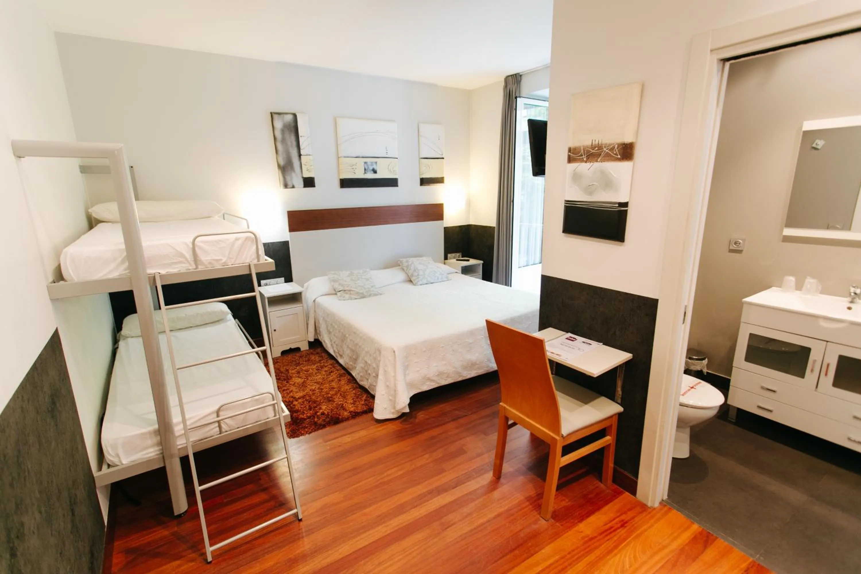 Photo of the whole room, Bed in Hostal San Sebastian Centro