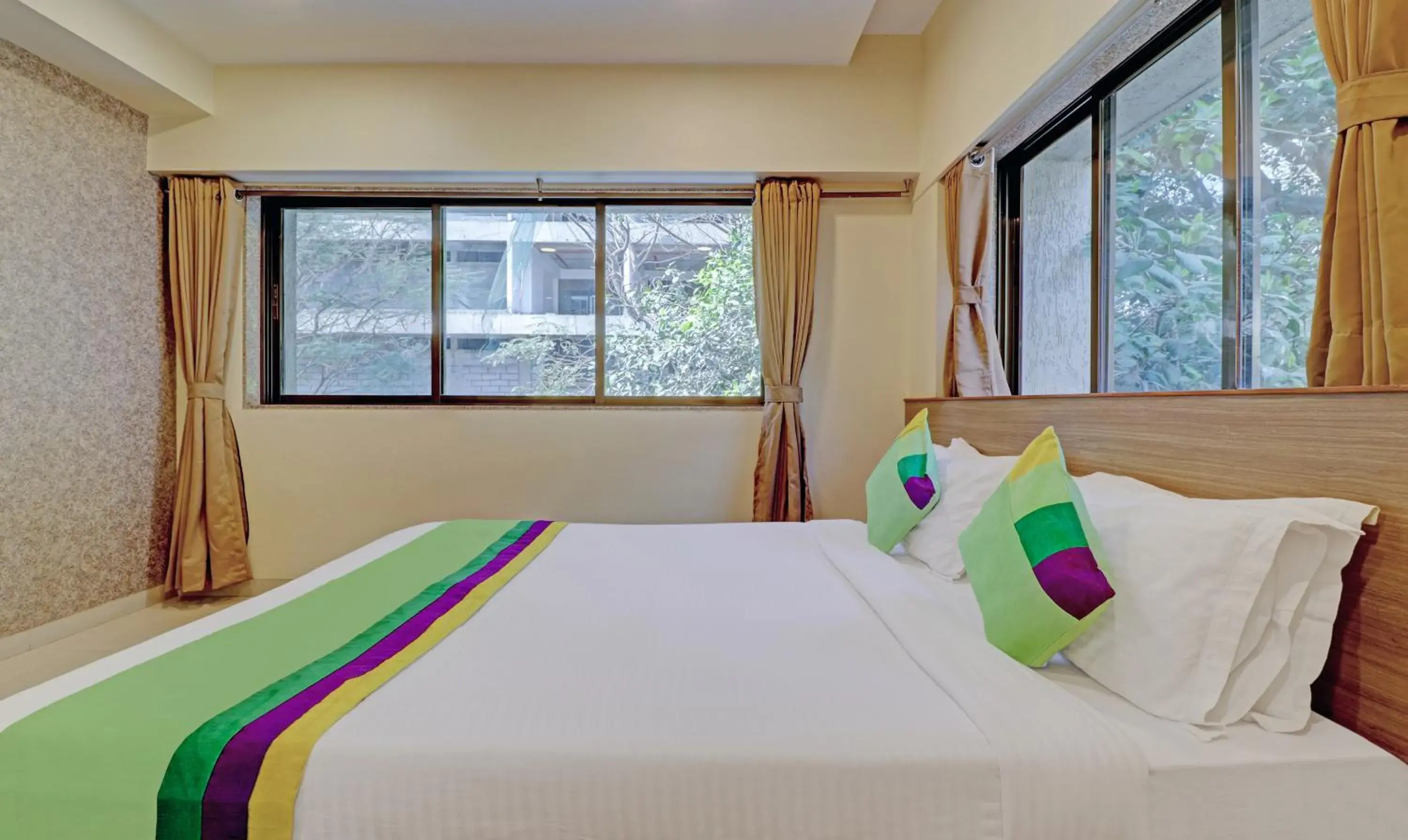 Bedroom, Bed in Treebo Vikrant Residency Bedroom, Bed in Treebo Vikrant Residency
