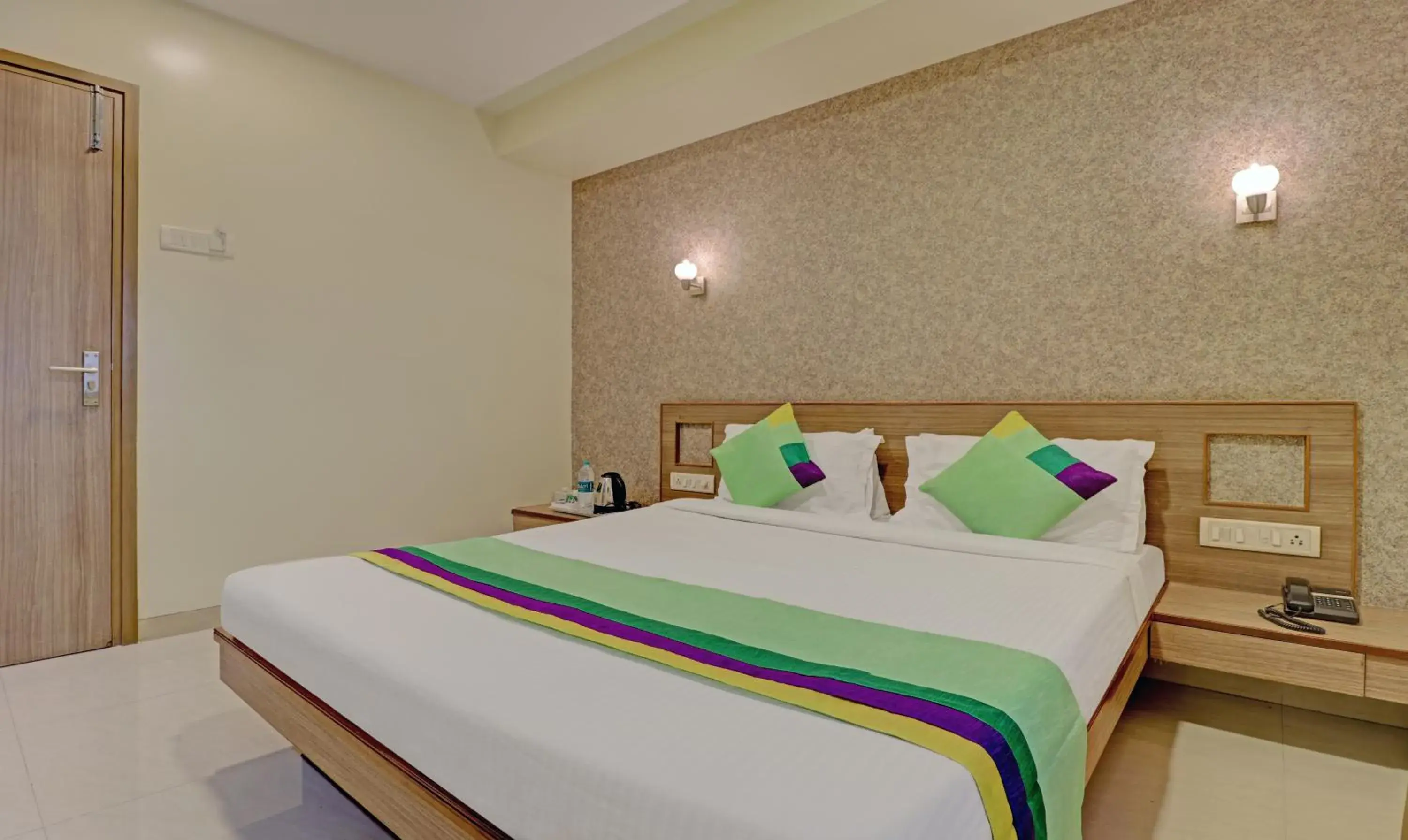 Bedroom, Bed in Treebo Vikrant Residency Bedroom, Bed in Treebo Vikrant Residency