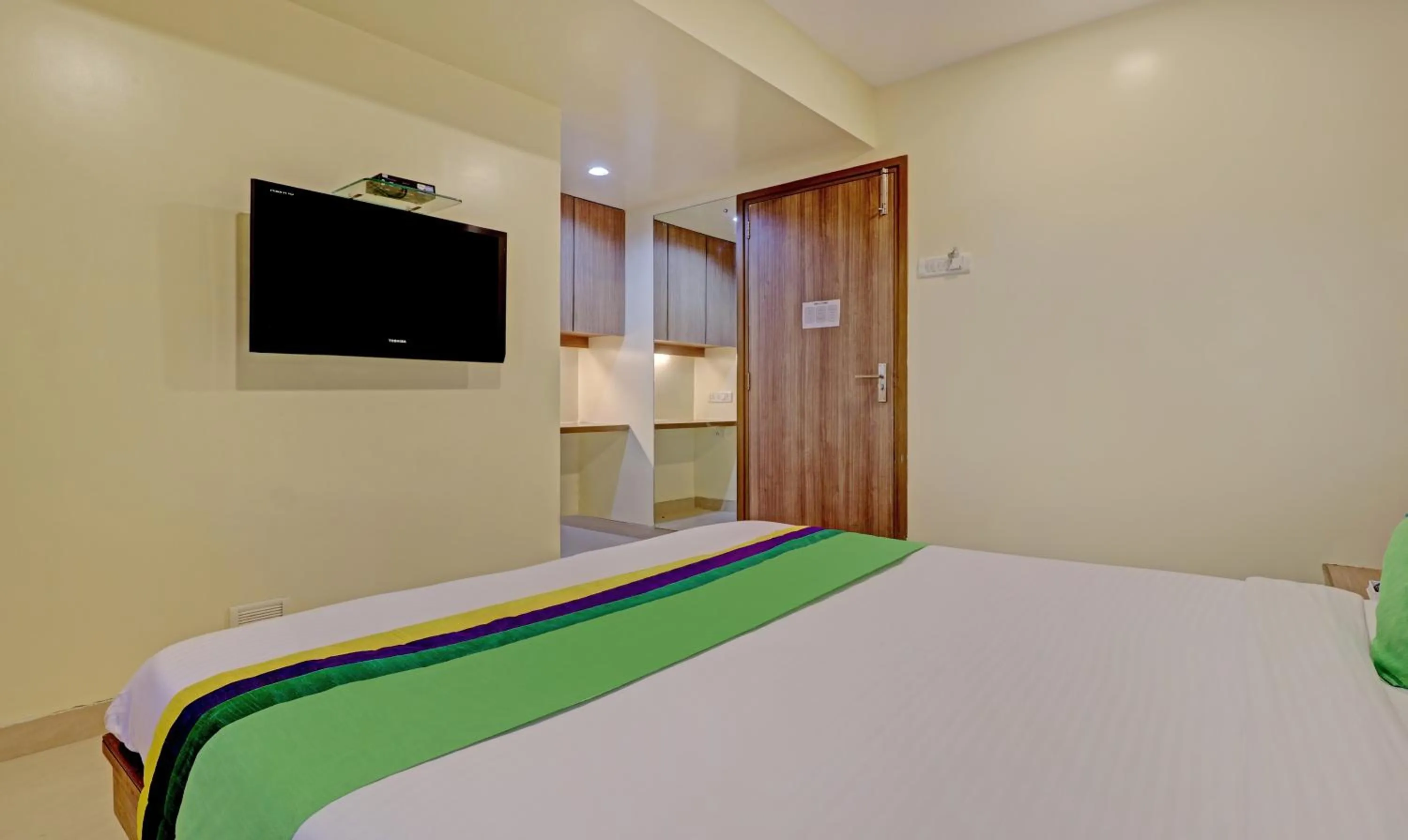 Bedroom, Bed in Treebo Vikrant Residency