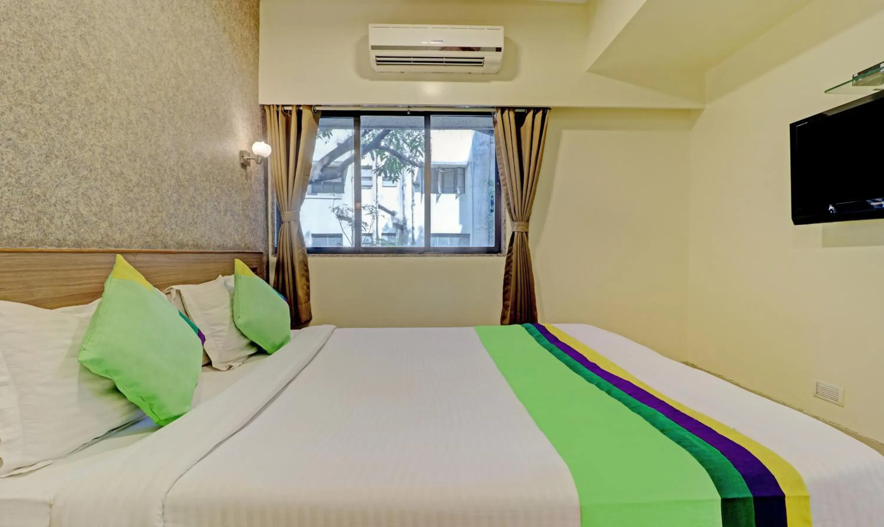 Bedroom, Bed in Treebo Vikrant Residency Bedroom, Bed in Treebo Vikrant Residency