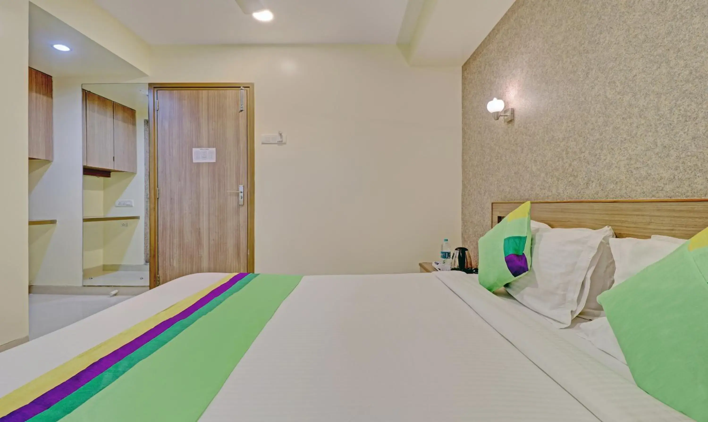Bedroom, Bed in Treebo Vikrant Residency Bedroom, Bed in Treebo Vikrant Residency