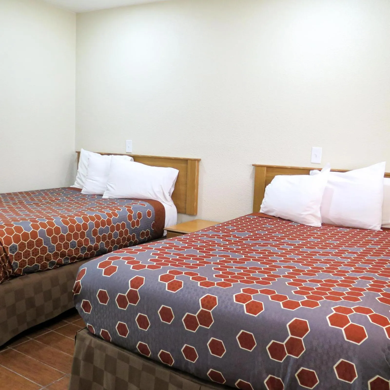 Bed in Townhouse Inn and Suites