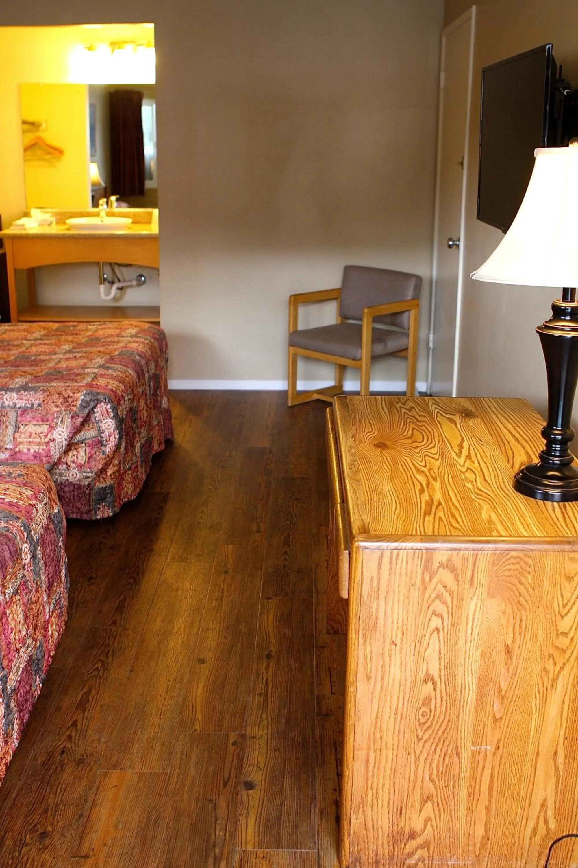 Bed in San Luis Inn and Suites