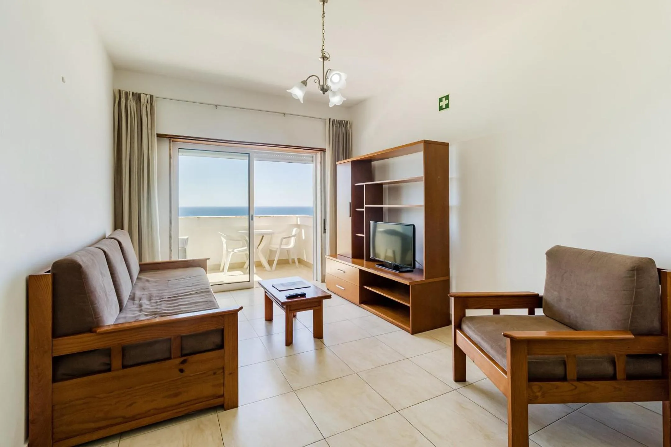 Living room in Torres Mira Praia by Garvetur