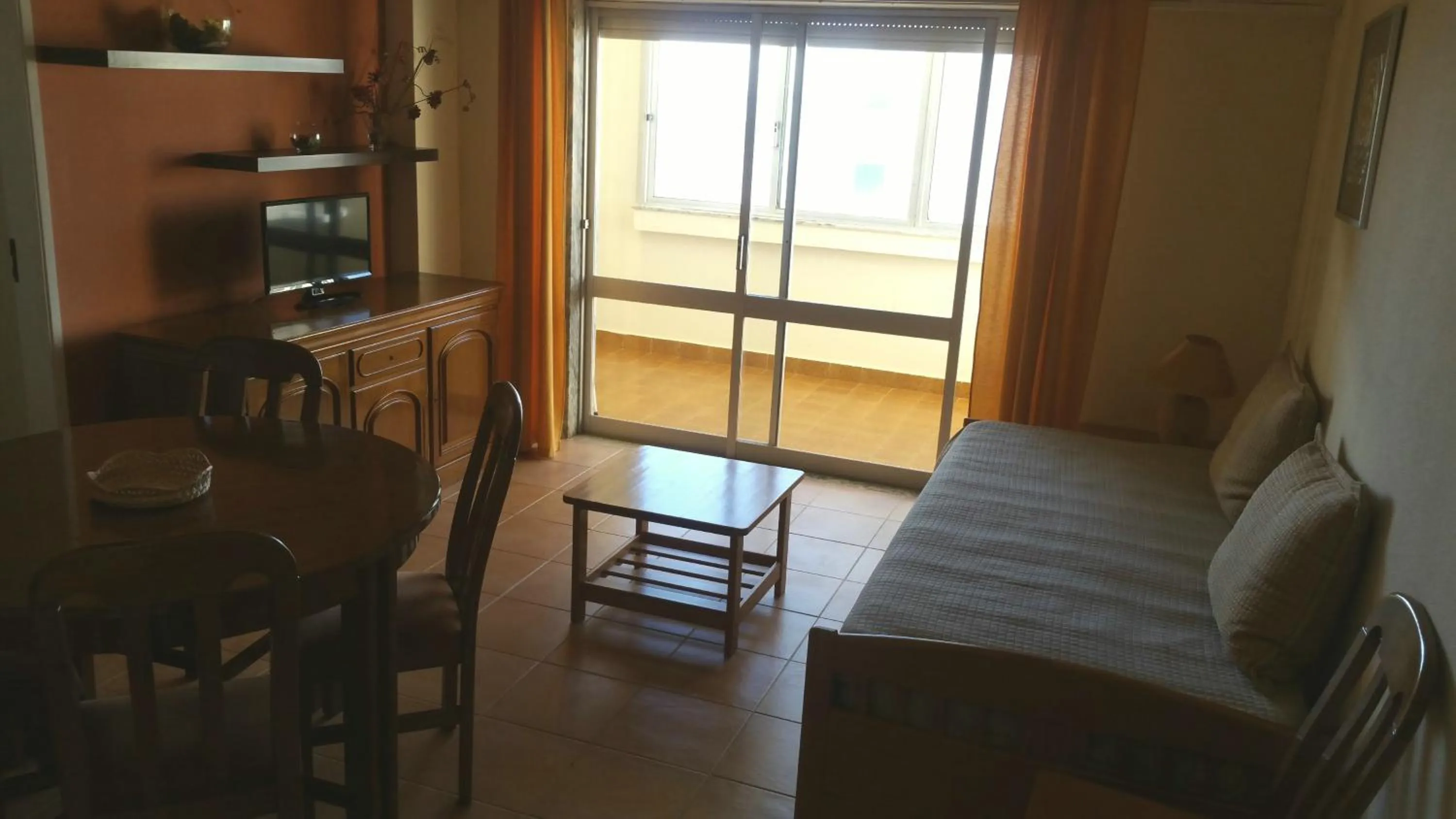 Living room in Torres Mira Praia by Garvetur