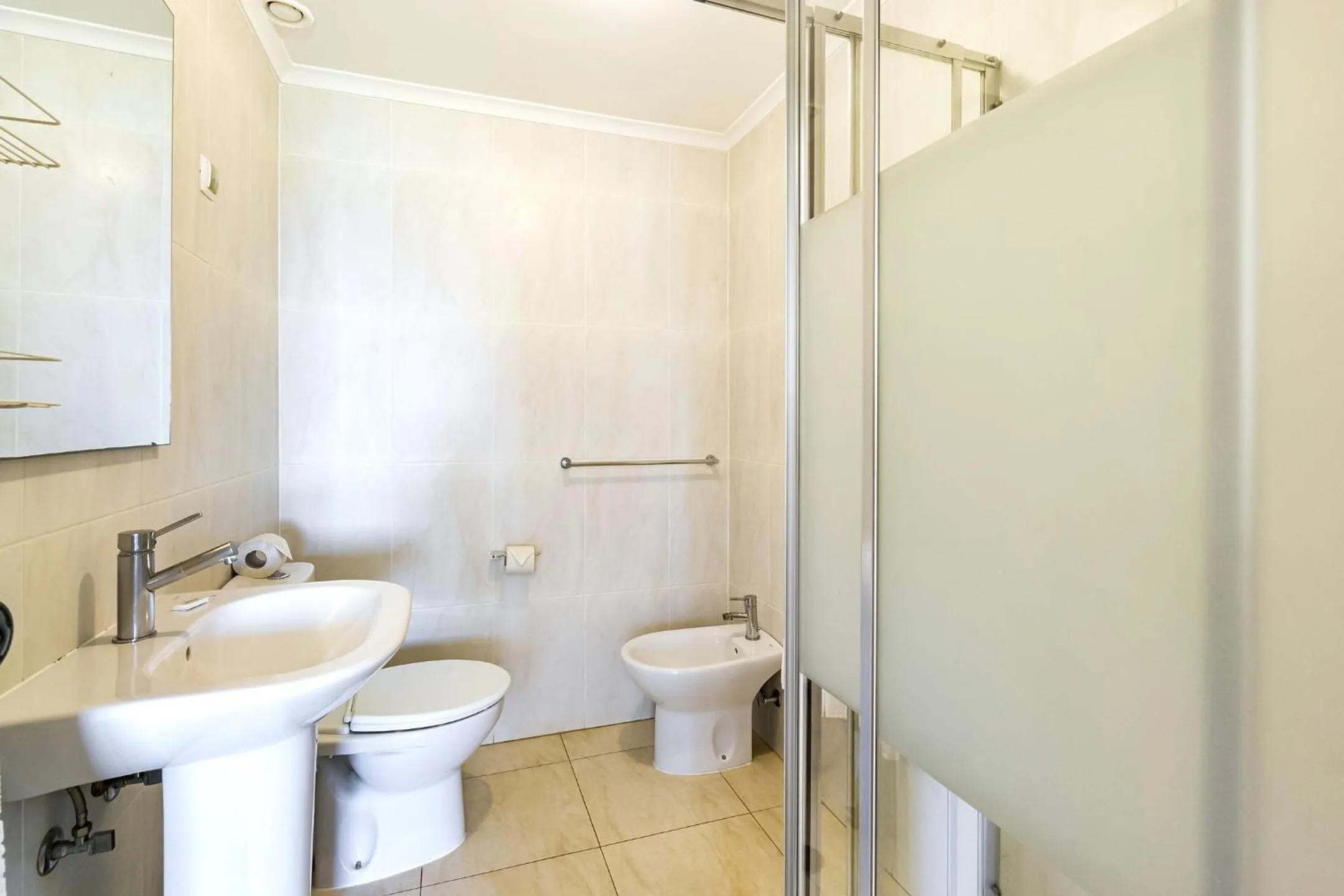 Bathroom in Torres Mira Praia by Garvetur