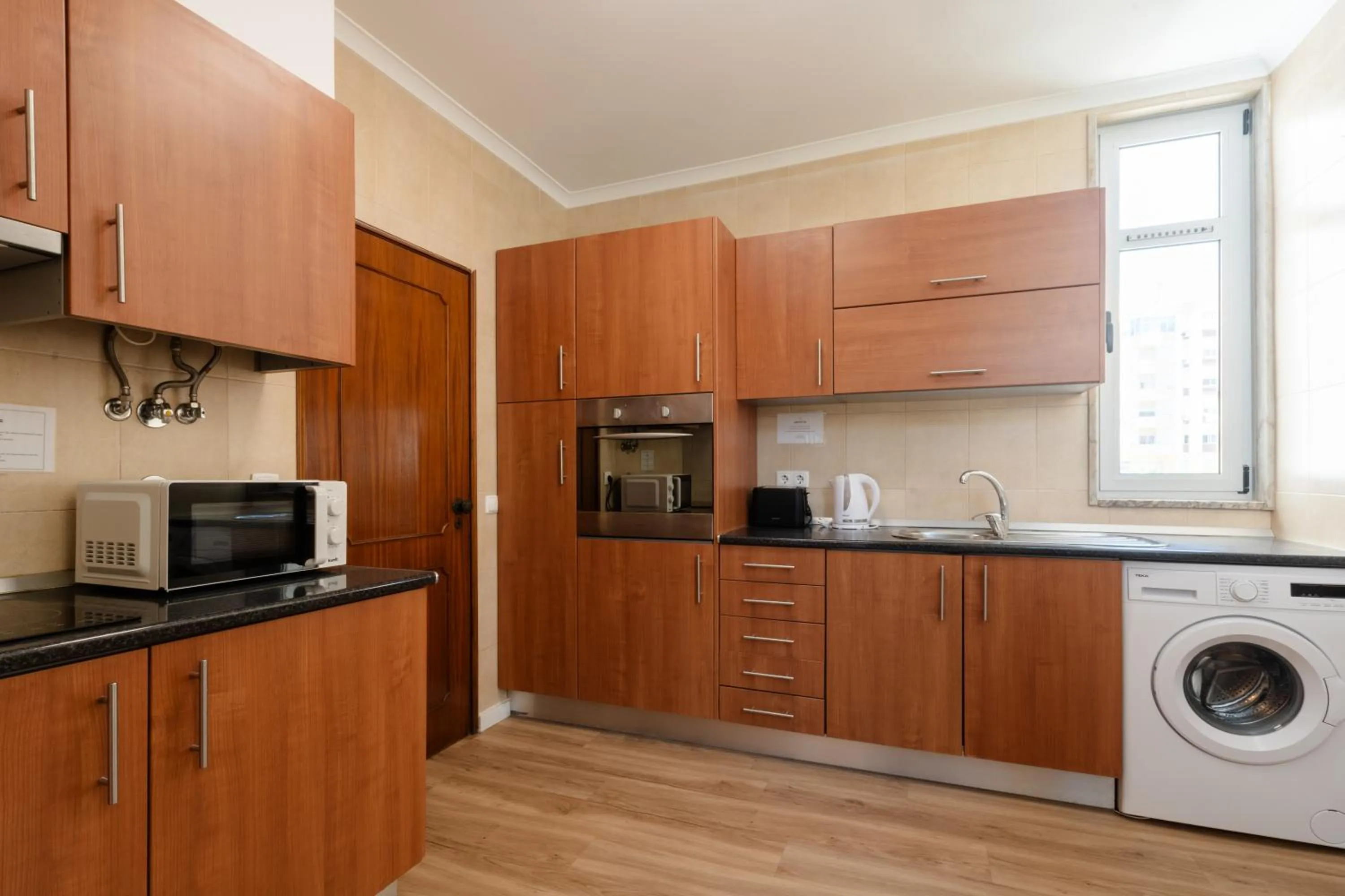 kitchen in Torres Mira Praia by Garvetur