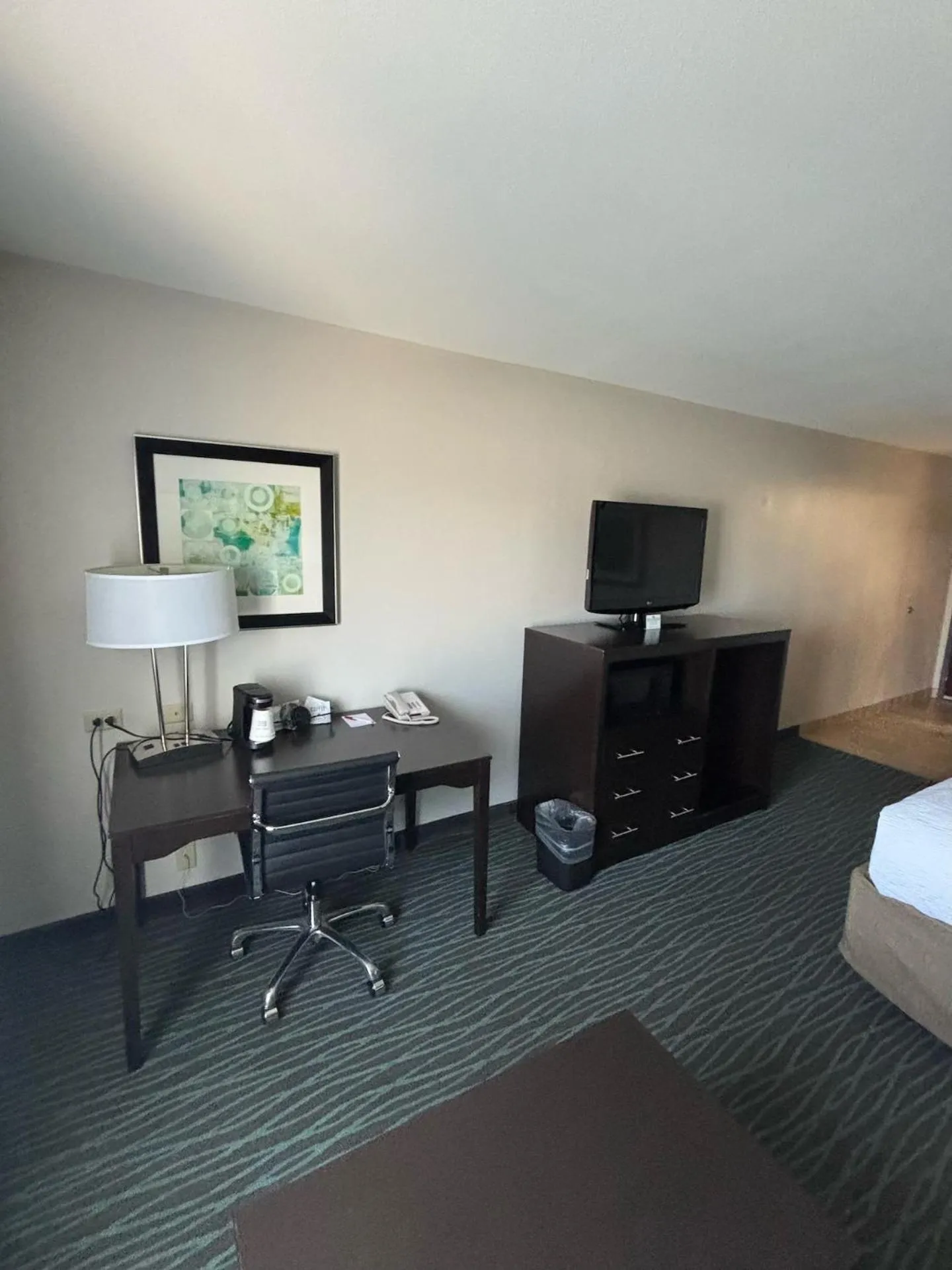 Communal lounge/ TV room in Ramada by Wyndham Burkburnett - Wichita Falls