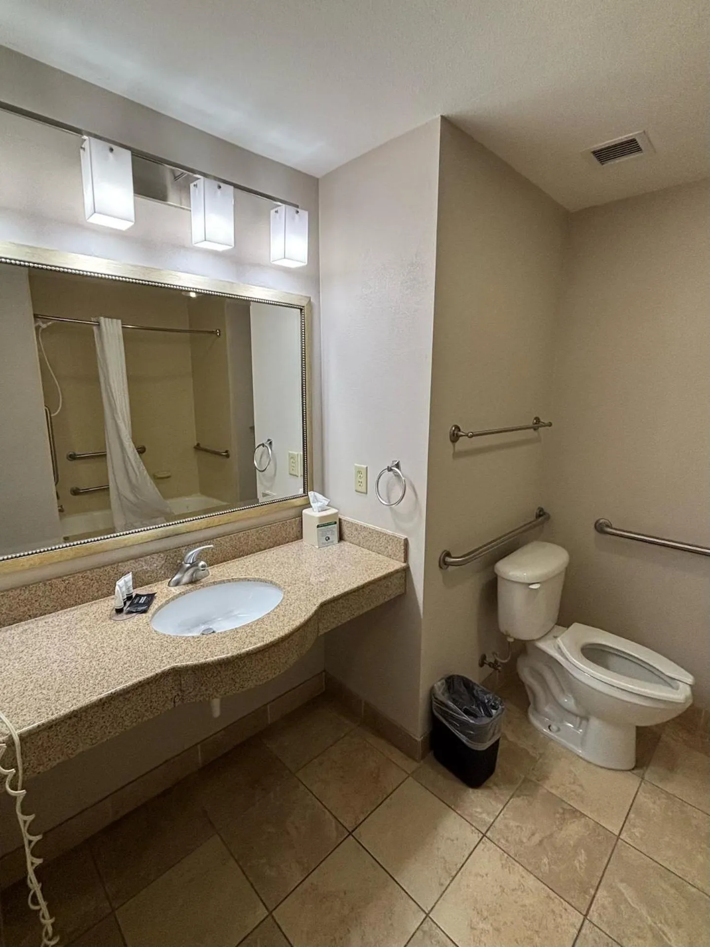 Bathroom in Ramada by Wyndham Burkburnett - Wichita Falls