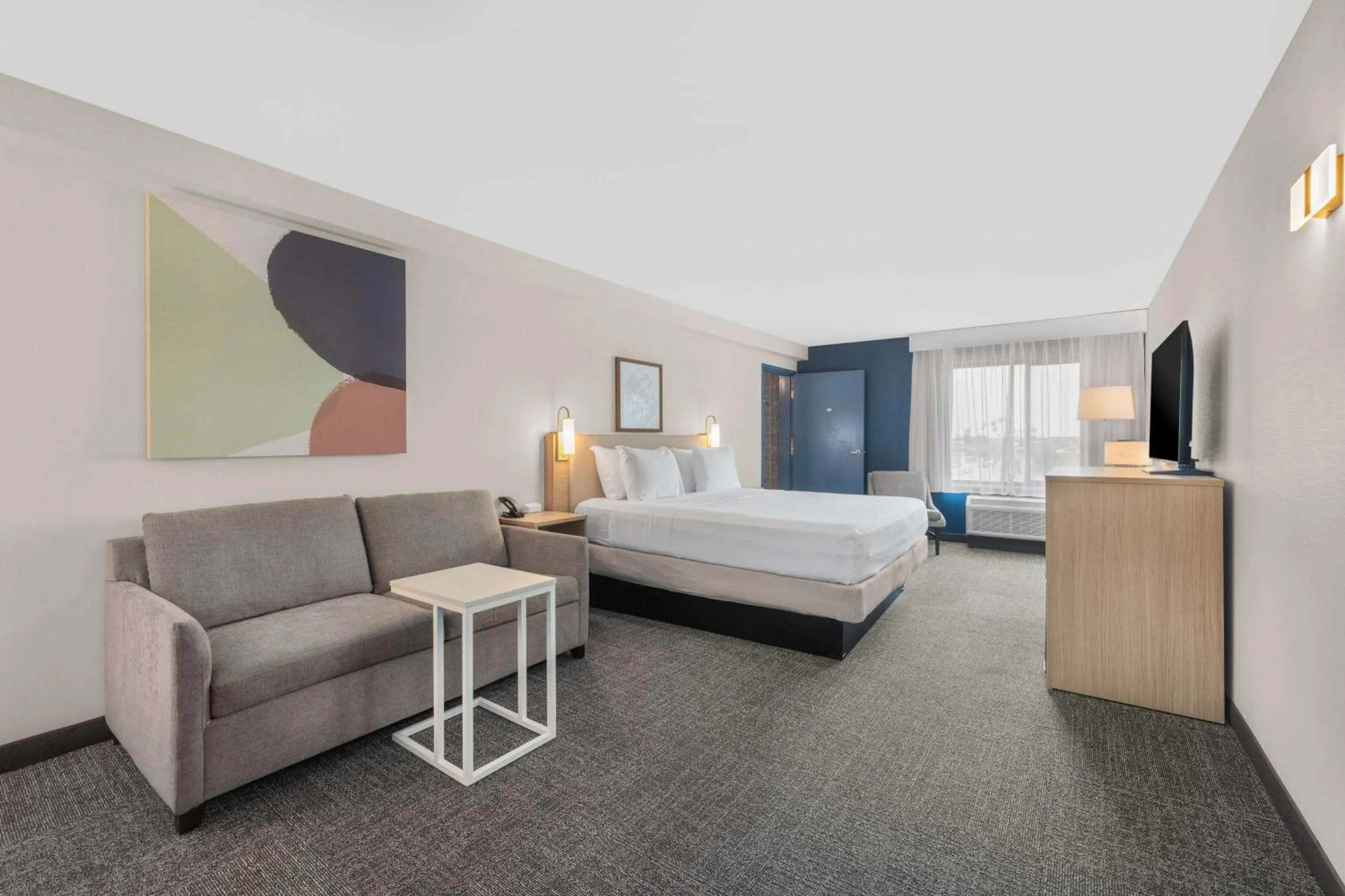 Living room, Bed in Spark by Hilton Bakersfield Central