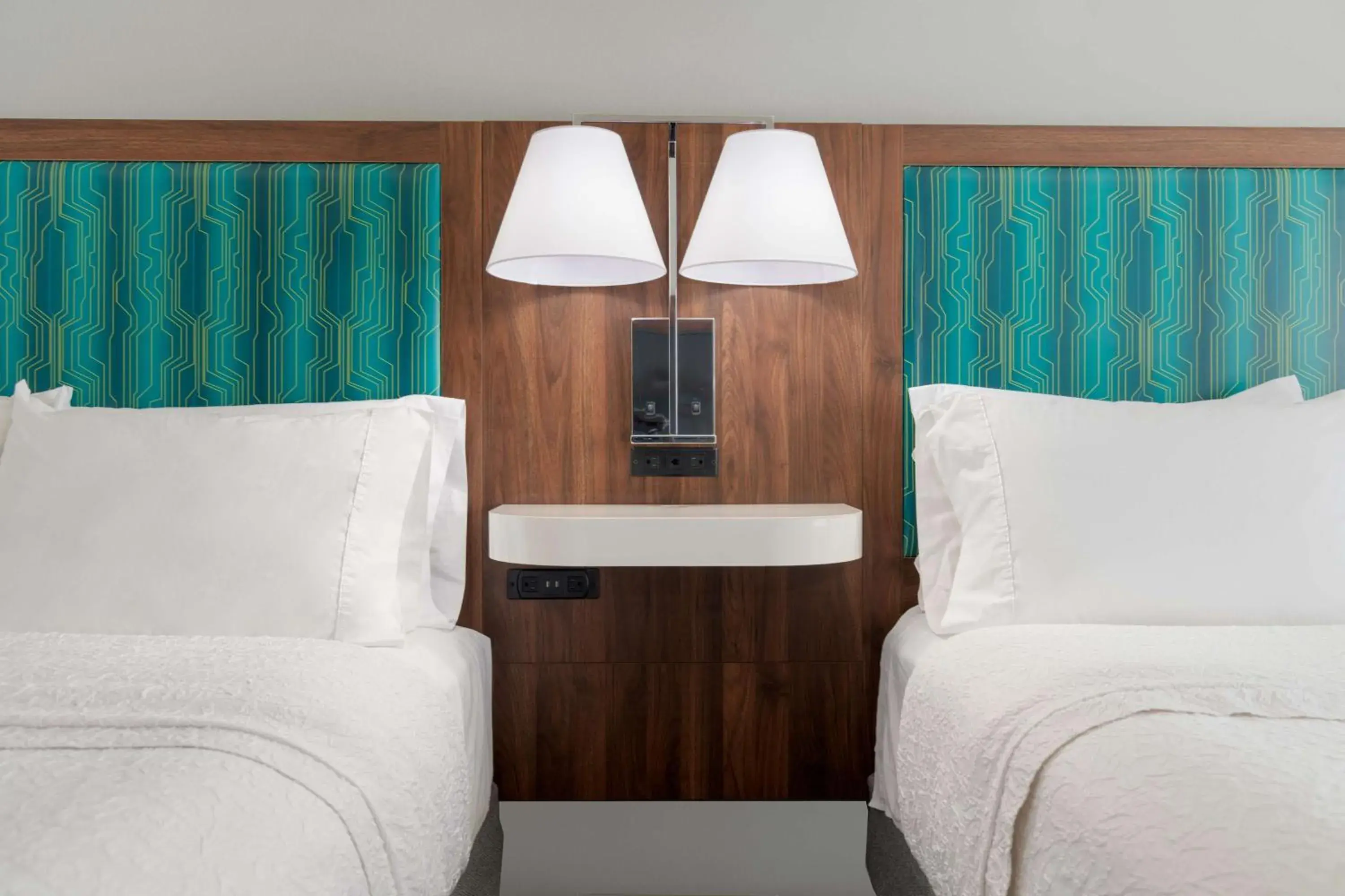 Bed in Hampton Inn & Suites Brookings Bed in Hampton Inn & Suites Brookings