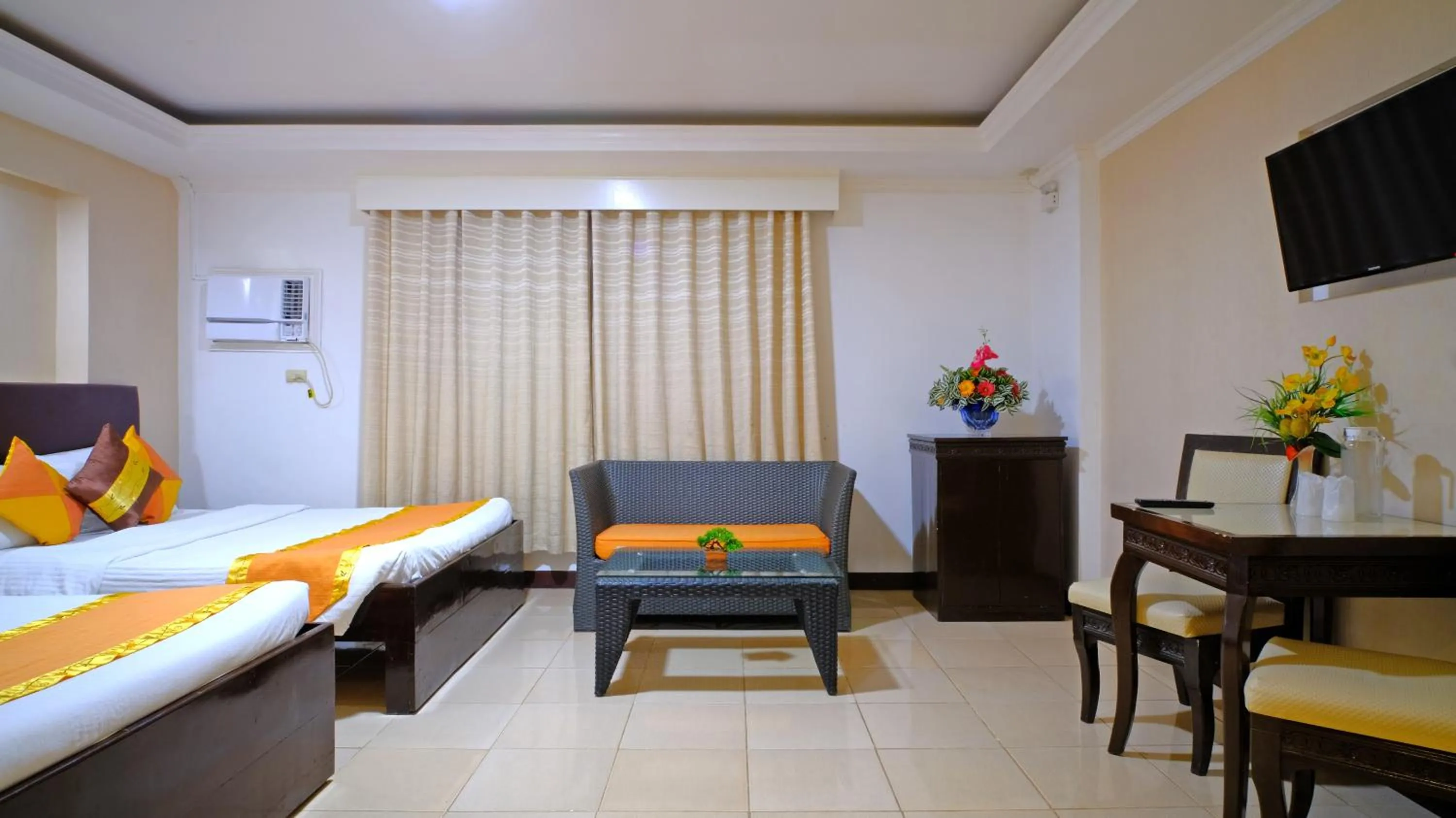 Living room, Bed in Boracay Holiday Resort