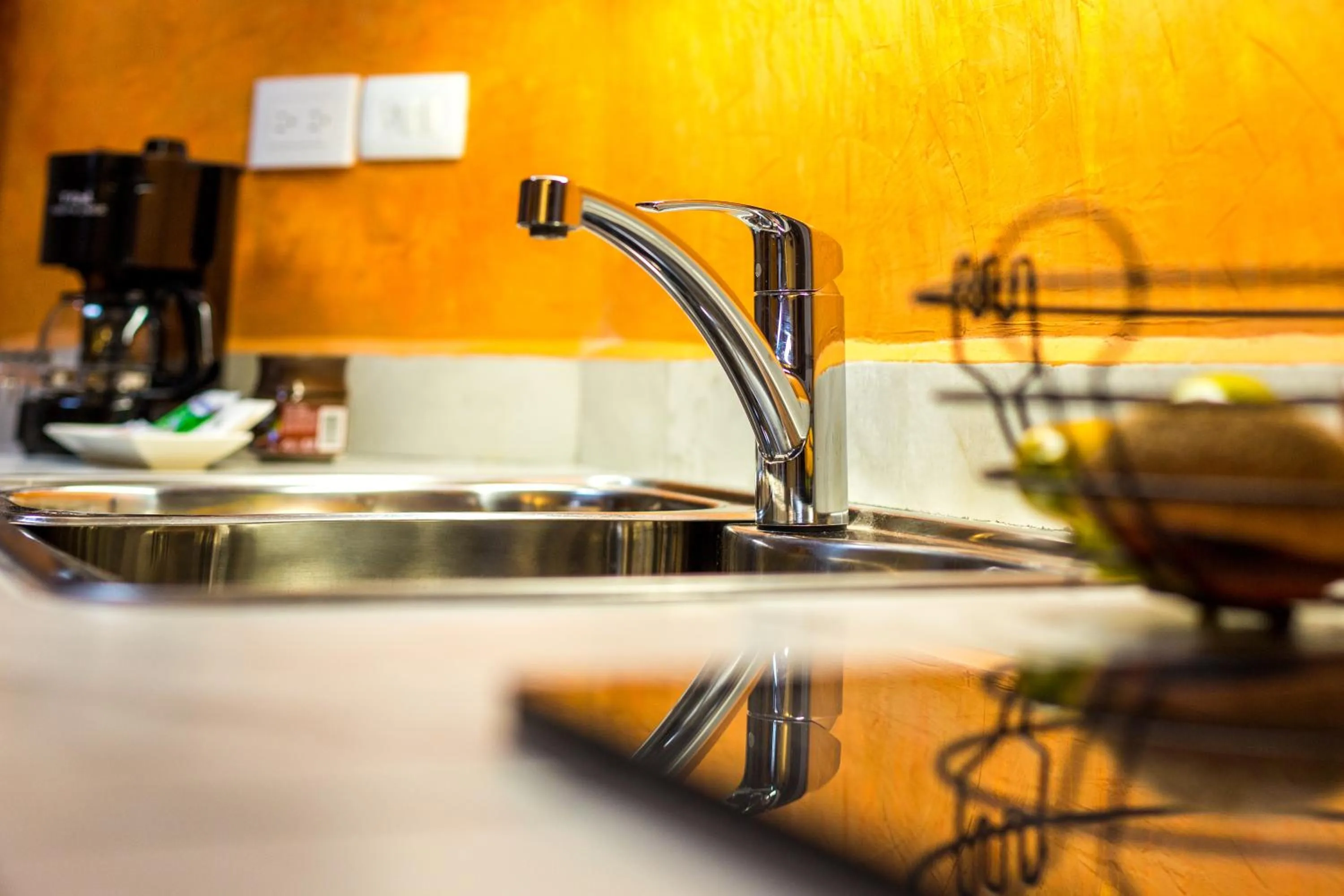 Kitchen or kitchenette in Merida Serviced Apartments