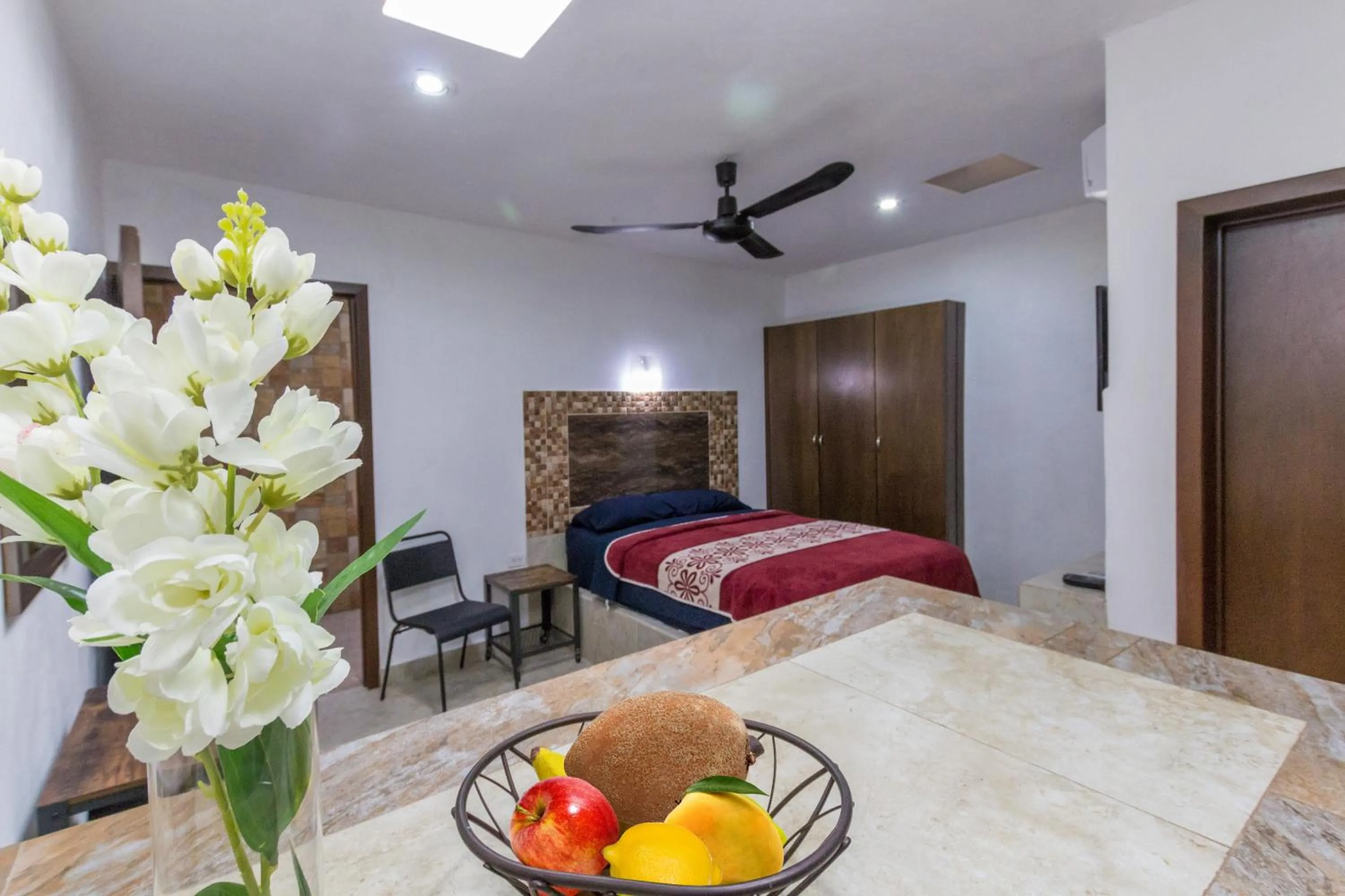Photo of the whole room, Bed in Merida Serviced Apartments